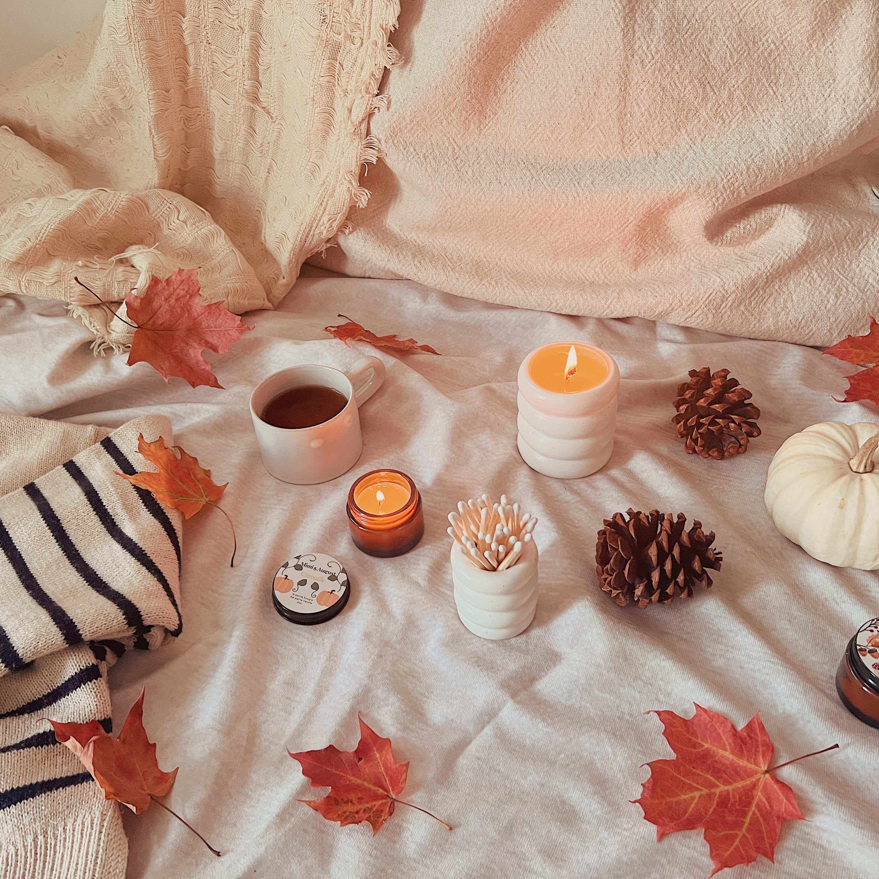Cozy fall rituals including autumn wardrobe, leaves, candles, decor, nail polish and hot drinks