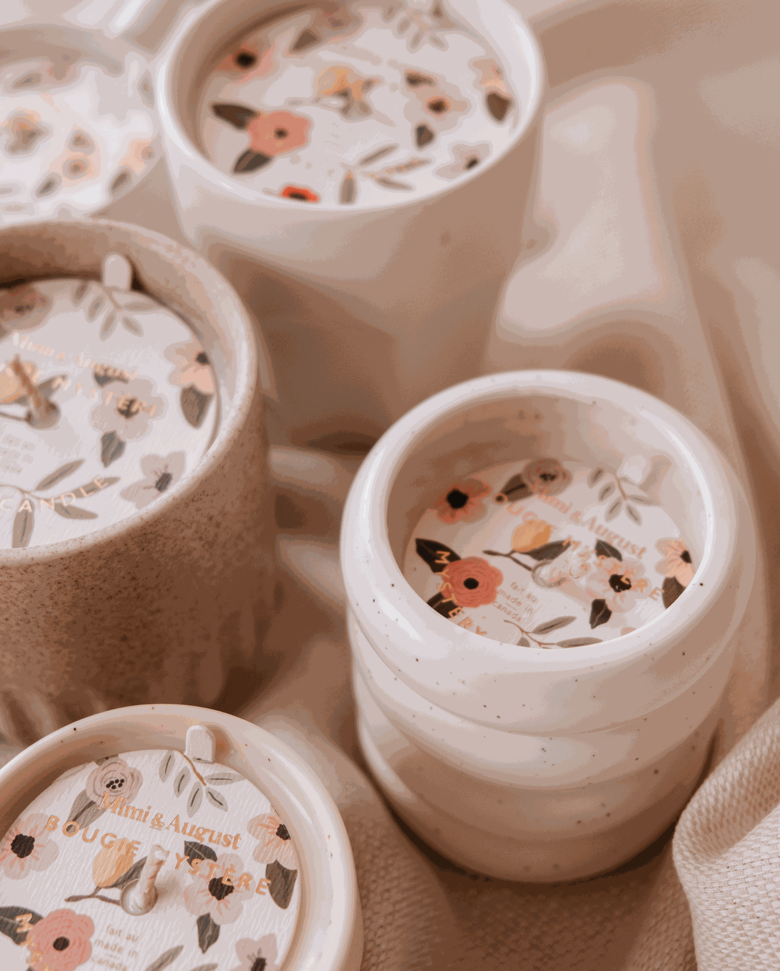 A set of Mystery Candle ceramic mugs with enchanting floral designs by Mimi & August. Limited quantity available.