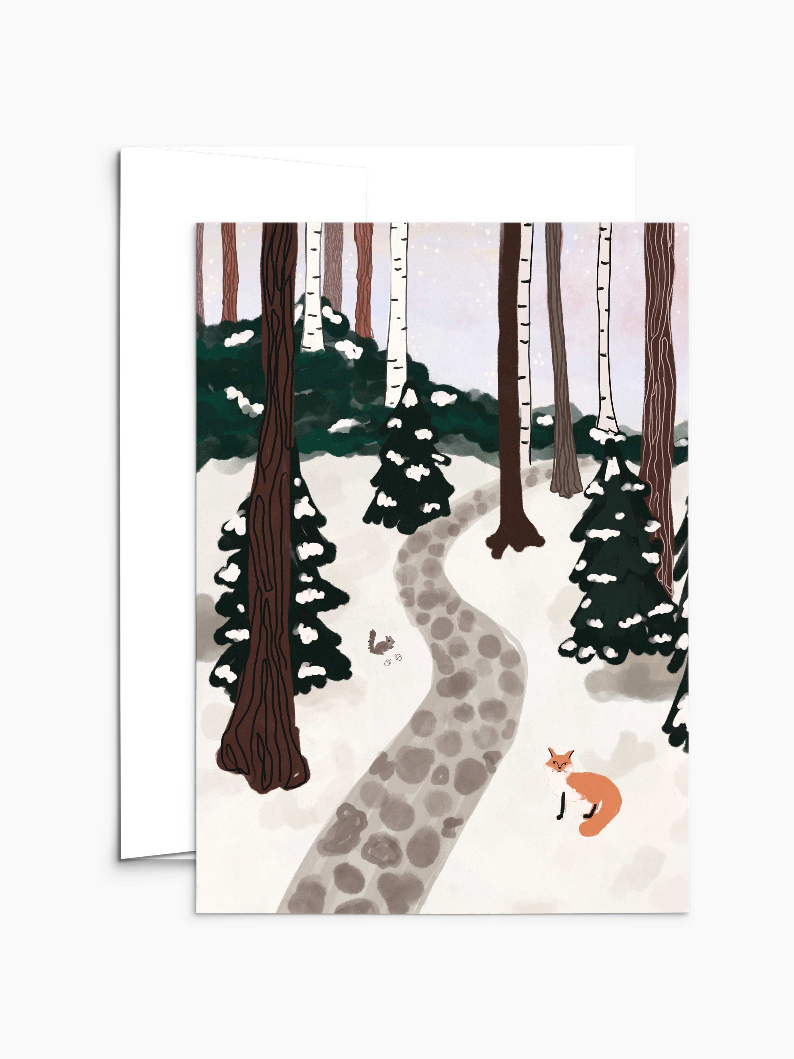 A depiction of a snowy forest with towering trees, ideal for Christmas greeting cards, featuring a stone path meandering through the landscape where a fox and rabbit frolic in the foreground. Presenting the "A Forest Full of Winter Magic - Christmas Greeting Card" by Mimi & August.