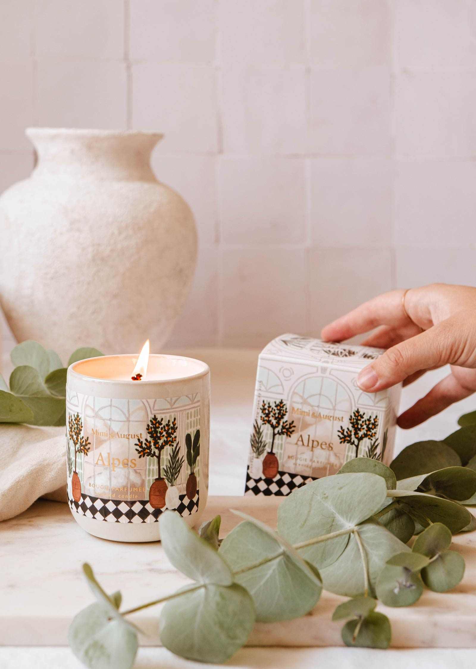 Alpes Reusable Candle with greens, balsam, cedar, and eucalyptus scent in ceramic container