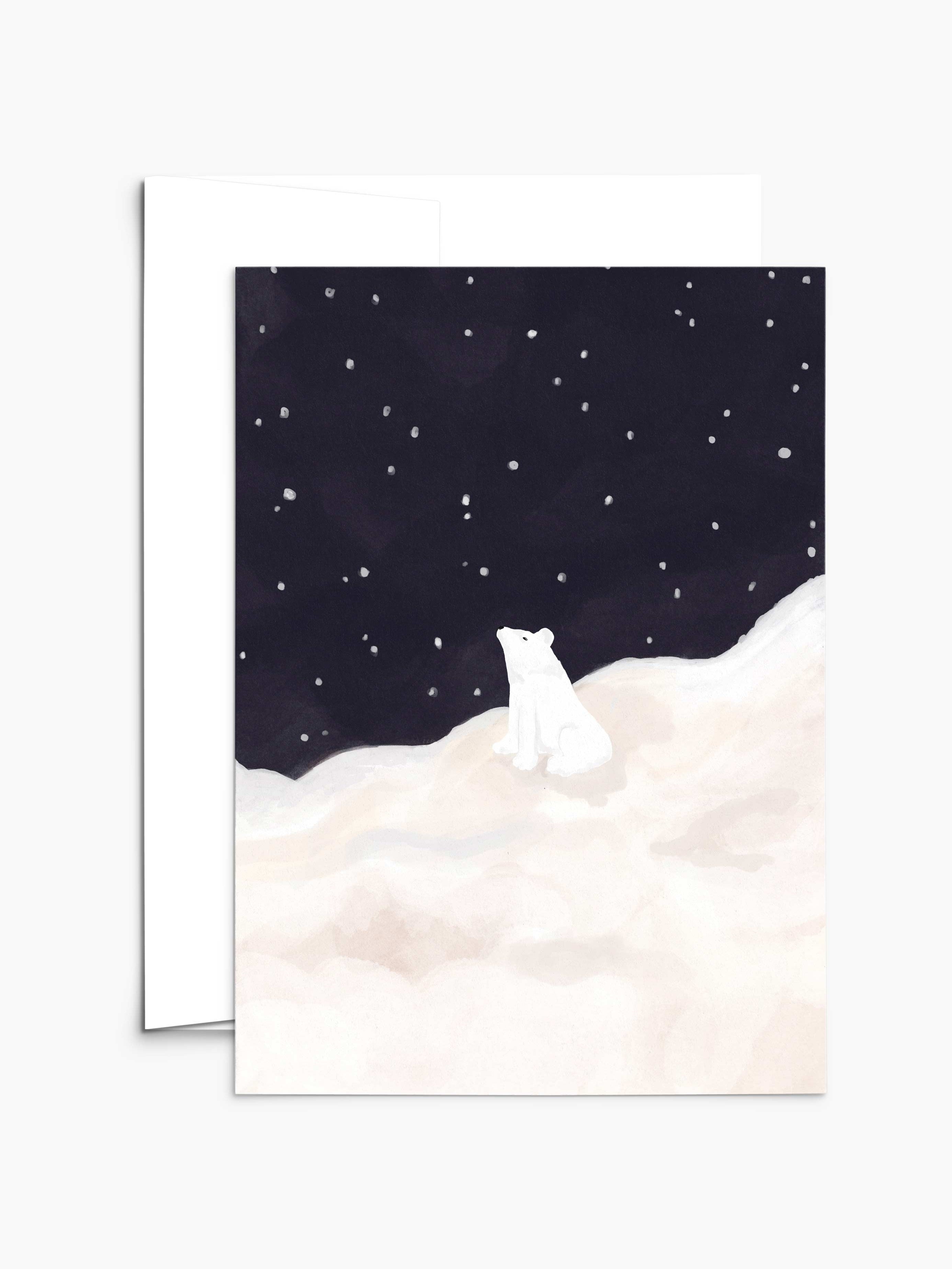 The "Bear-y Merry Wishes Under the Stars - Christmas Greeting Card" by Mimi & August features an illustration of a white polar bear sitting on a snowy hill beneath a starry night sky, ideal for Christmas greeting cards made from recycled paper.
