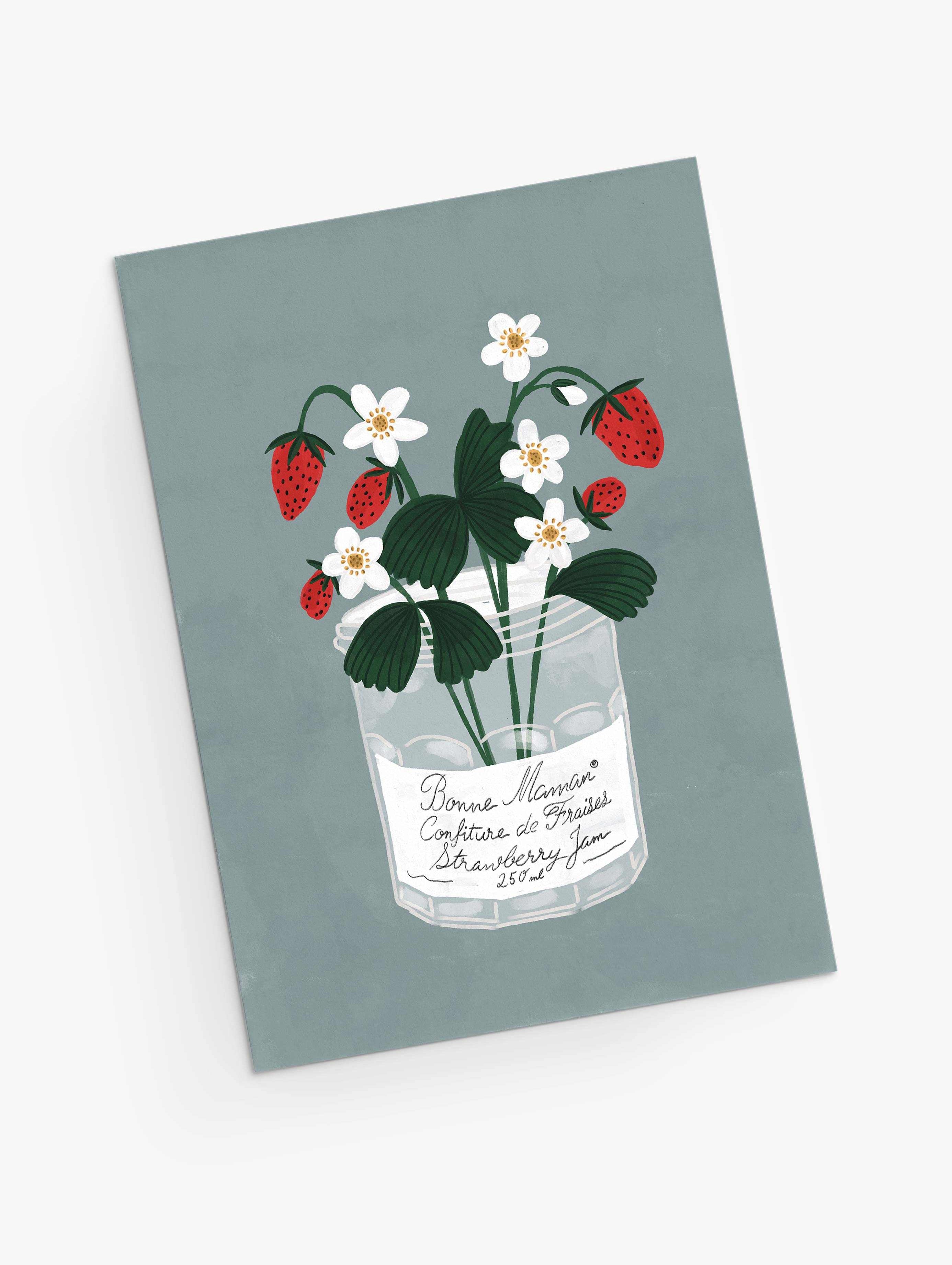 An illustration of a strawberry plant with white flowers and red strawberries growing out of a glass jar labeled "Mimi & August Mother's Day Card" on a grey background.