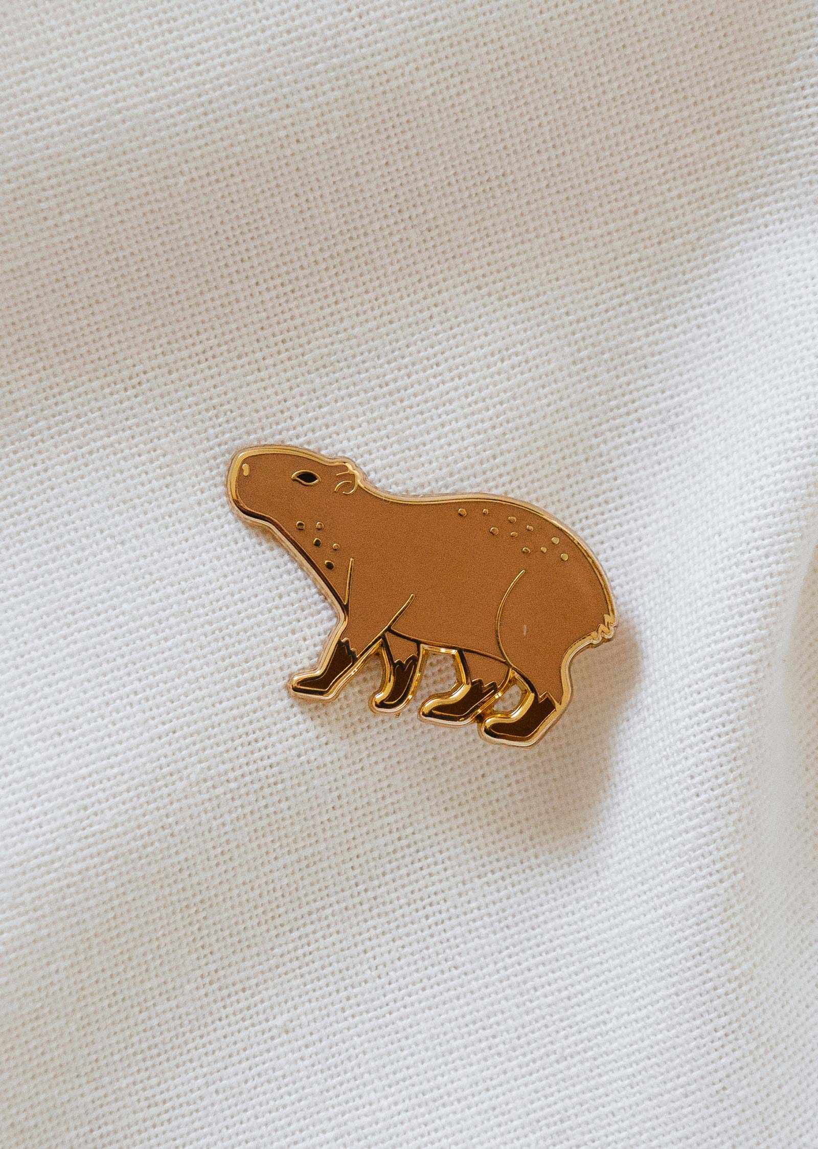 Colorful capybara enamel pin handcrafted in gold tone brass, 38mm size, designed in Montreal