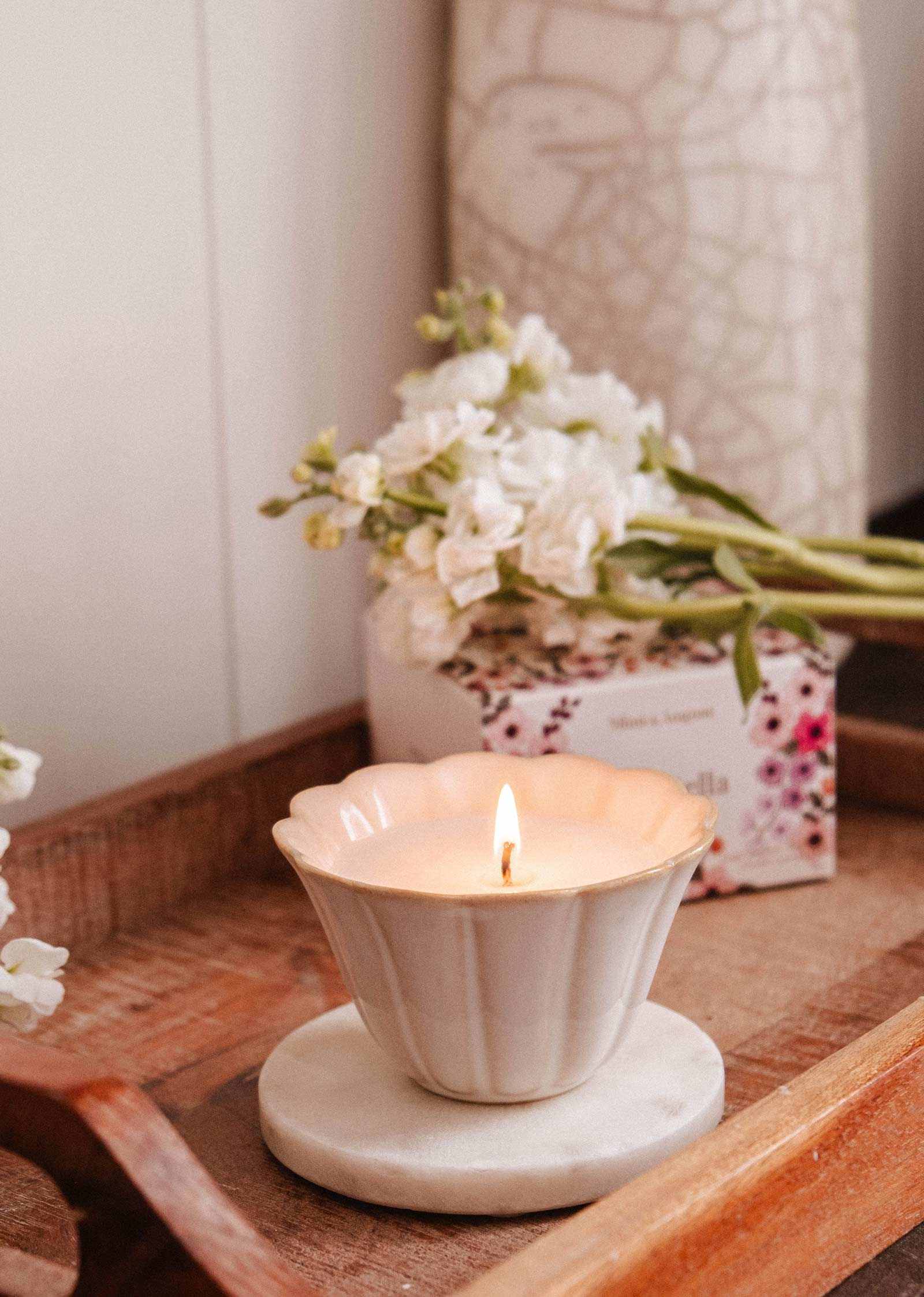 Ciao Bella reusable candle in ceramic jar with jasmine, violet, cedar, and citrus scent