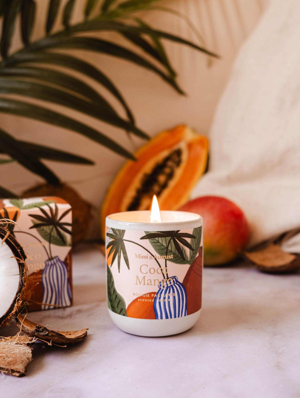 Coco Mango Reusable Candle in ceramic jar with tropical coconut mango scent