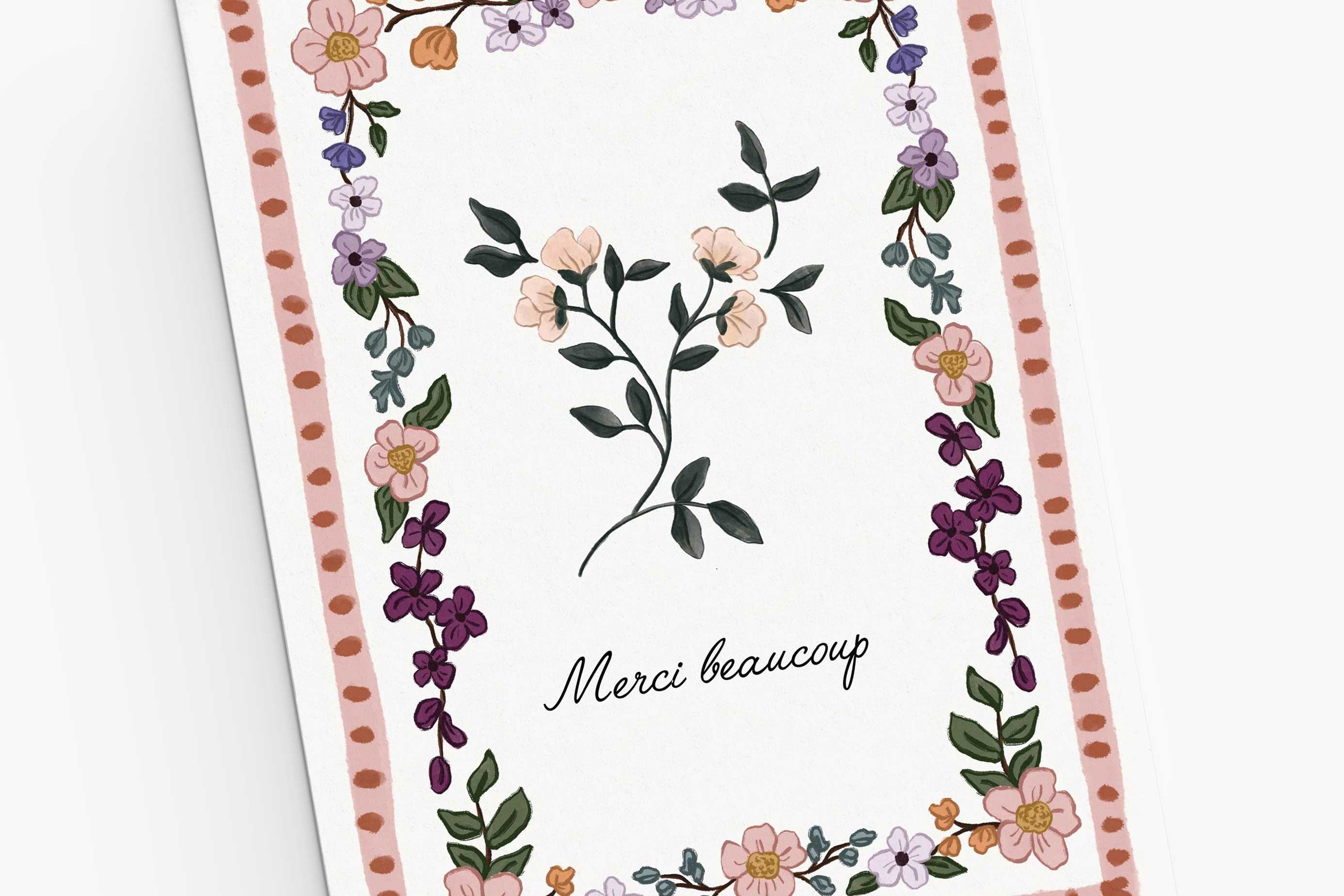 The Floral Thank You Greeting Card by Mimi & August features a vintage flower design with a delicate border and "Merci beaucoup" in cursive on recycled paper—perfect for expressing gratitude.
