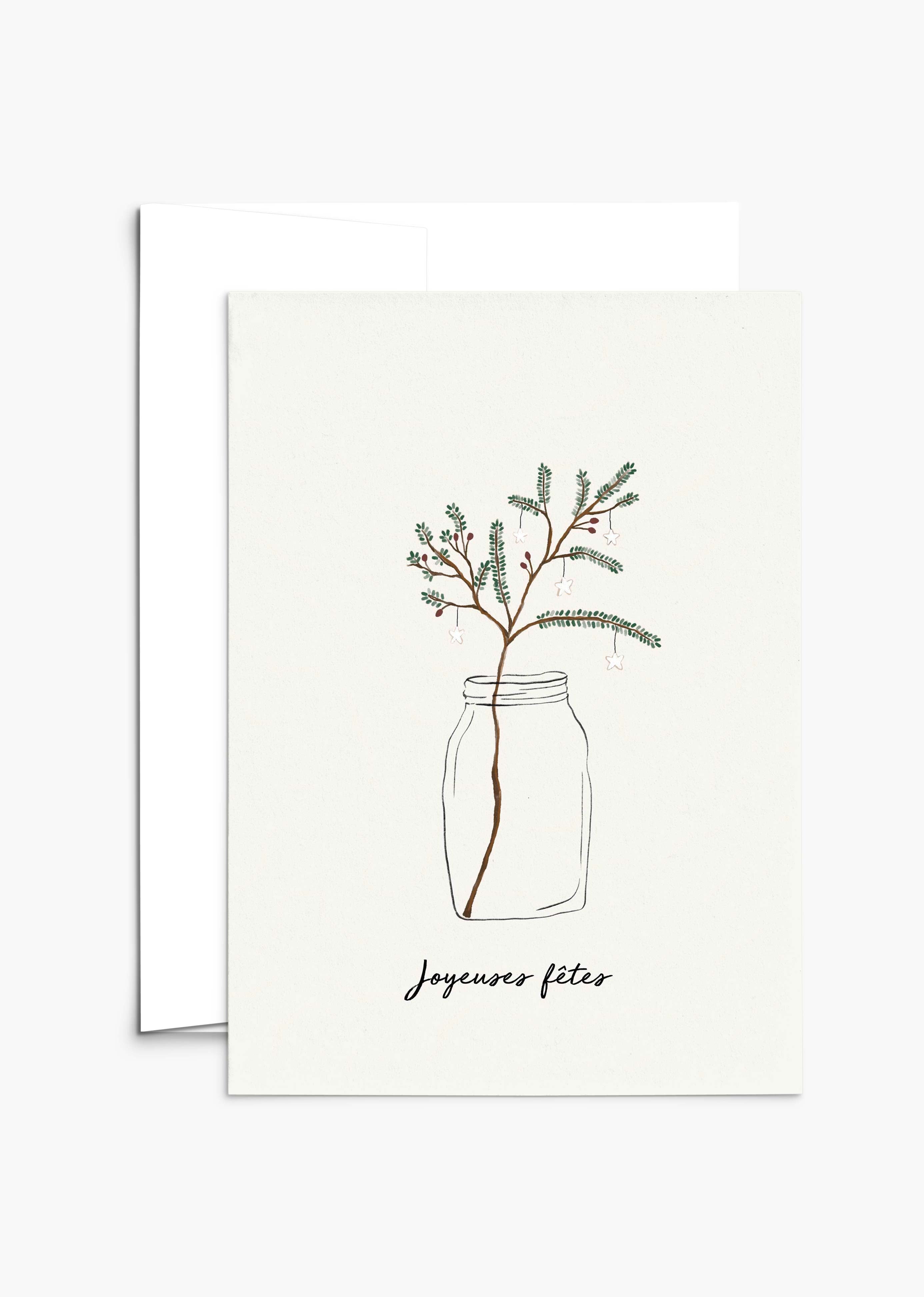 The Mimi & August Christmas Tree Branch Greeting Card is printed on recycled paper, features a simple pine branch in a jar with "Joyeuses fêtes" below, and is blank inside for your personal message.