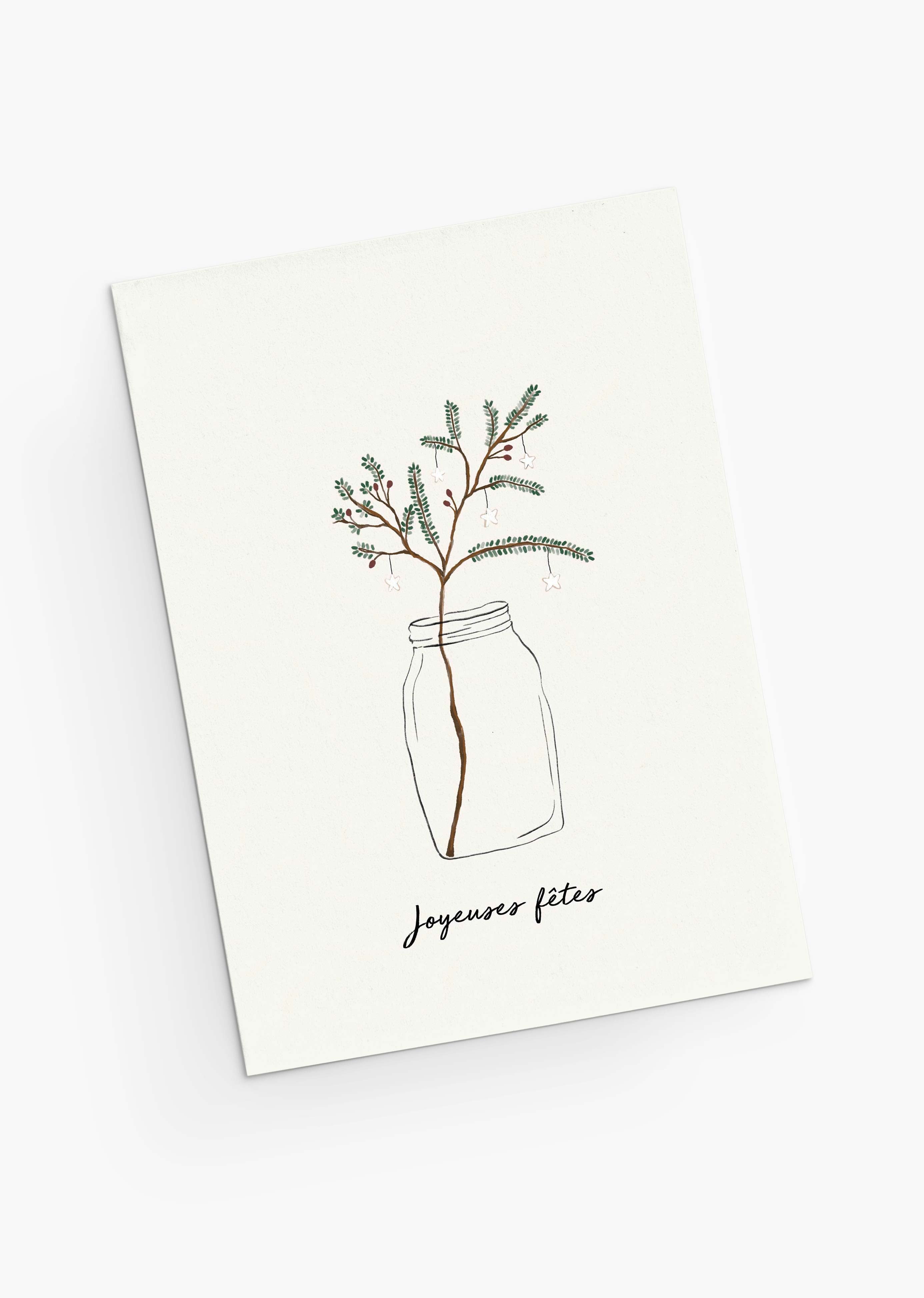 The Mimi & August Christmas Tree Branch Greeting Card features a festive branch in a glass jar and “Joyeuses fêtes” text, is blank inside for your message, and printed on recycled paper.