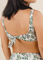 An Asian girl's back in a Lima Herboria Bralette Bikini Top.
