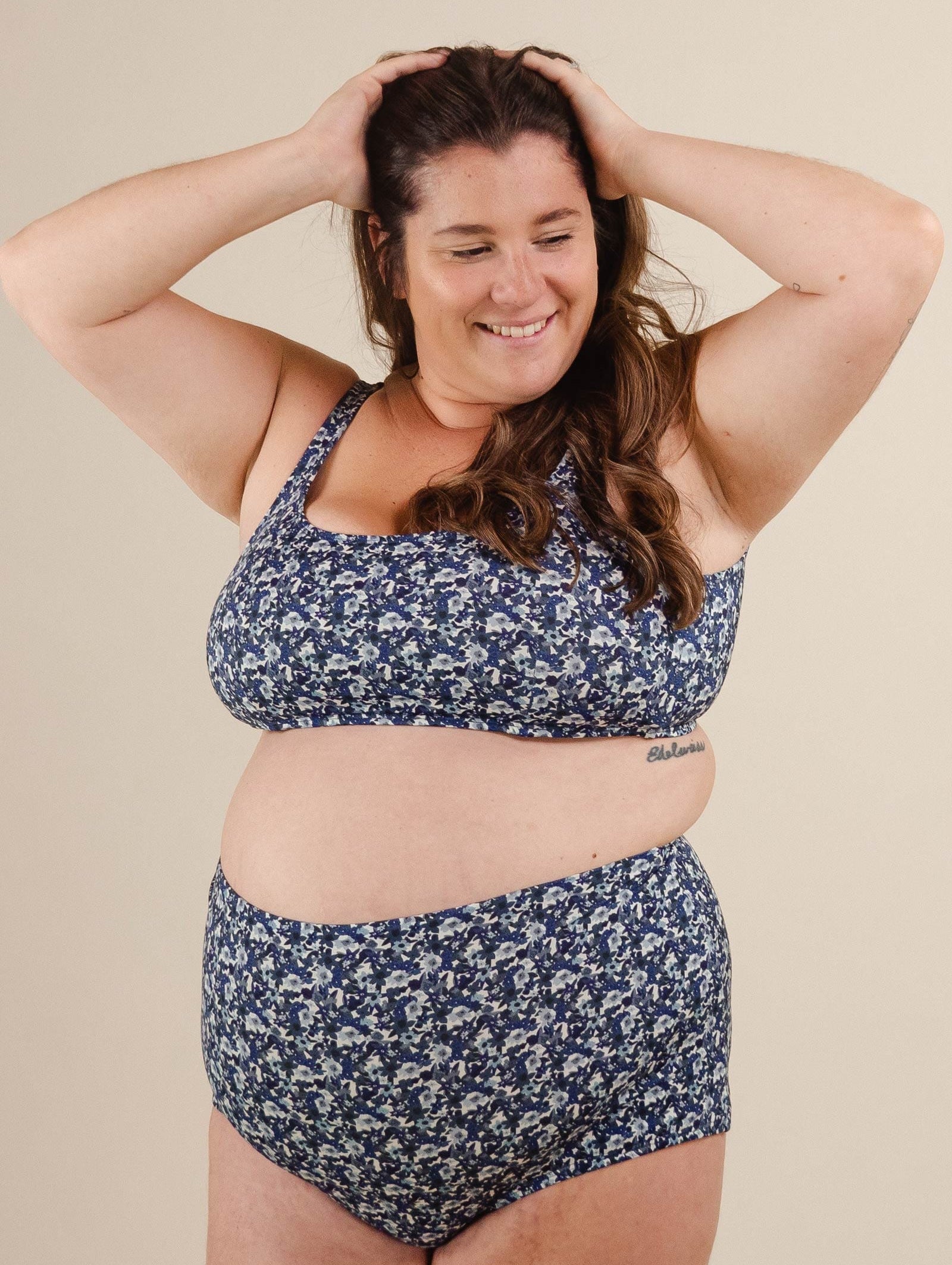 A Lima Moonflower Bralette Bikini Top on a pregnant woman.