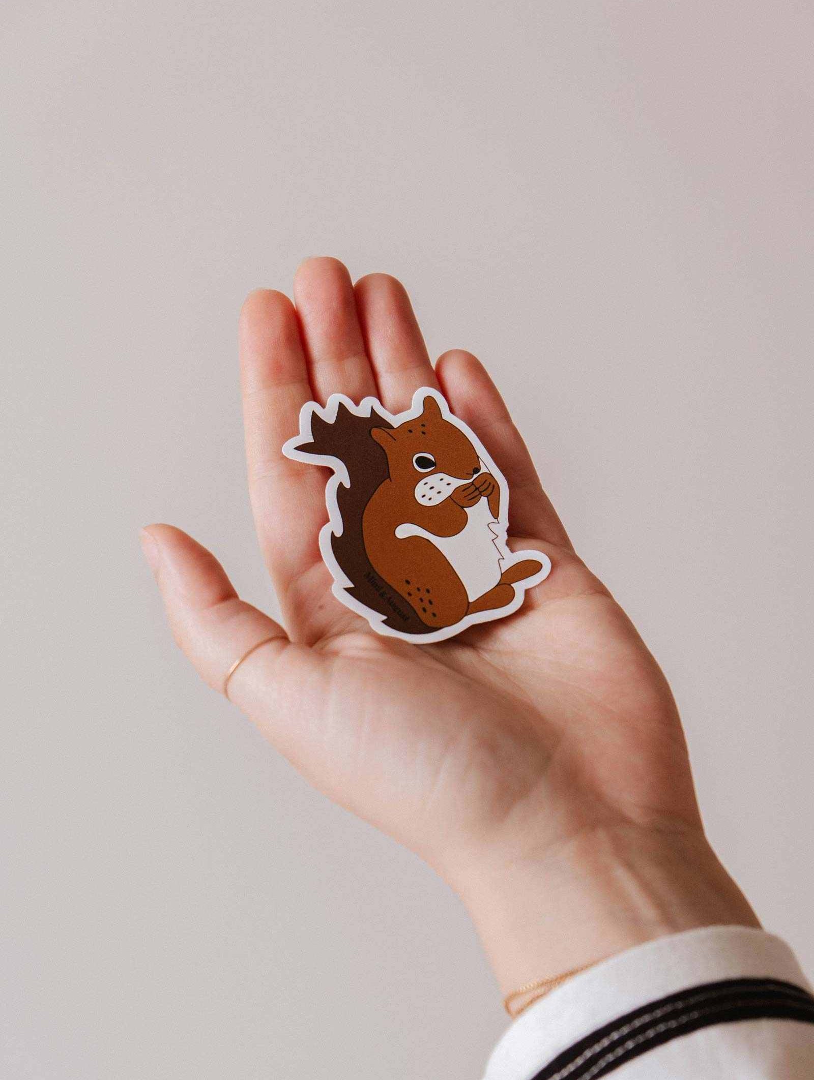 MTL Squirrel vinyl sticker with autumn tones and minimalist design
