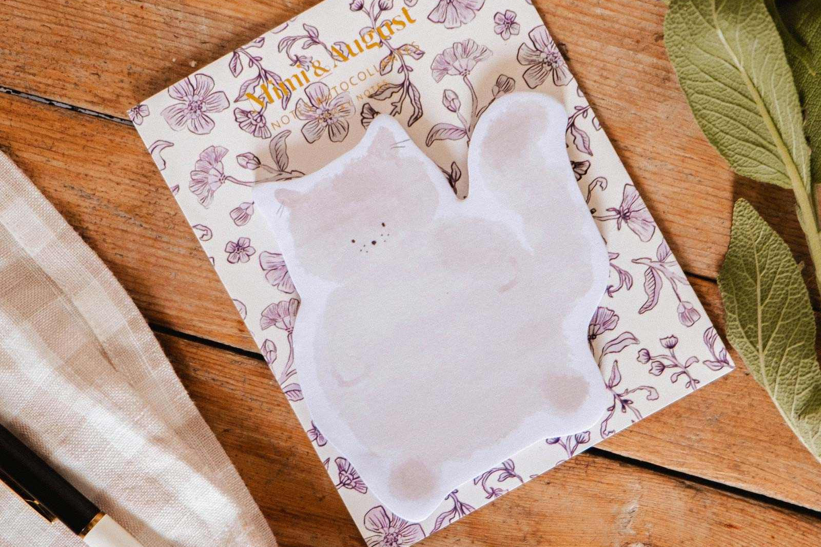 Meow Sticky Notes grey cat-shaped 50-sheet pad with cute sleepy eyes and strong adhesive