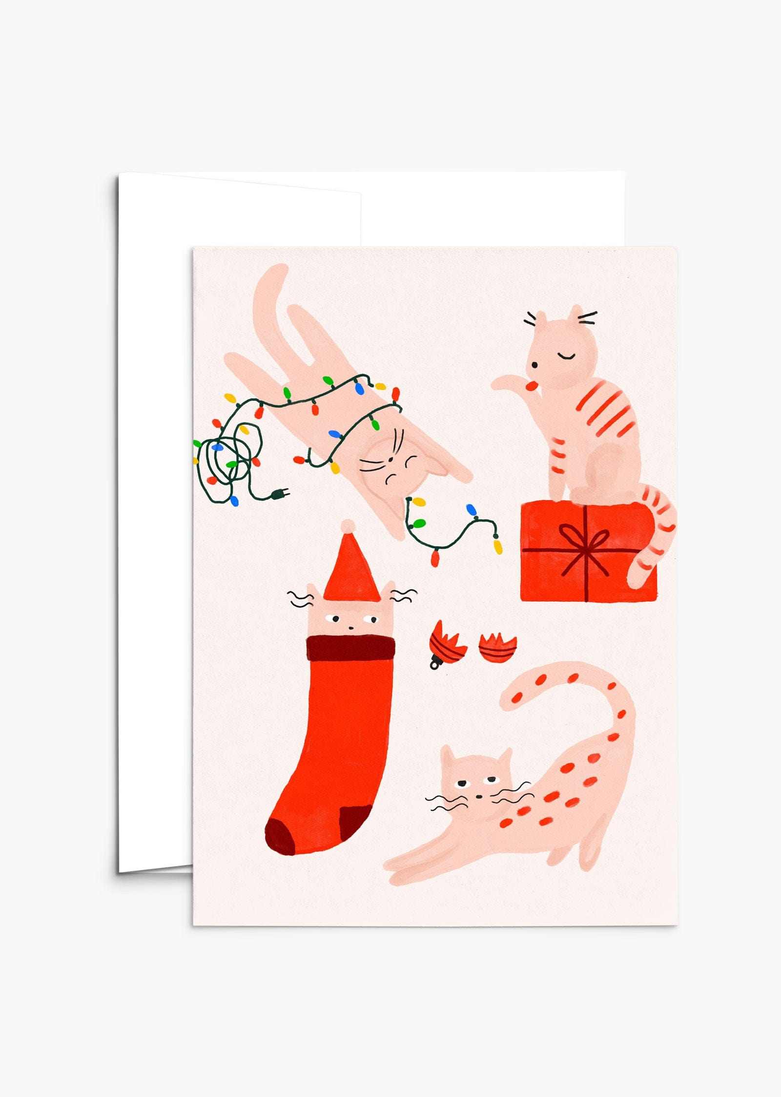 Four merry kitties playing with Christmas lights and gifts on a festive greeting card