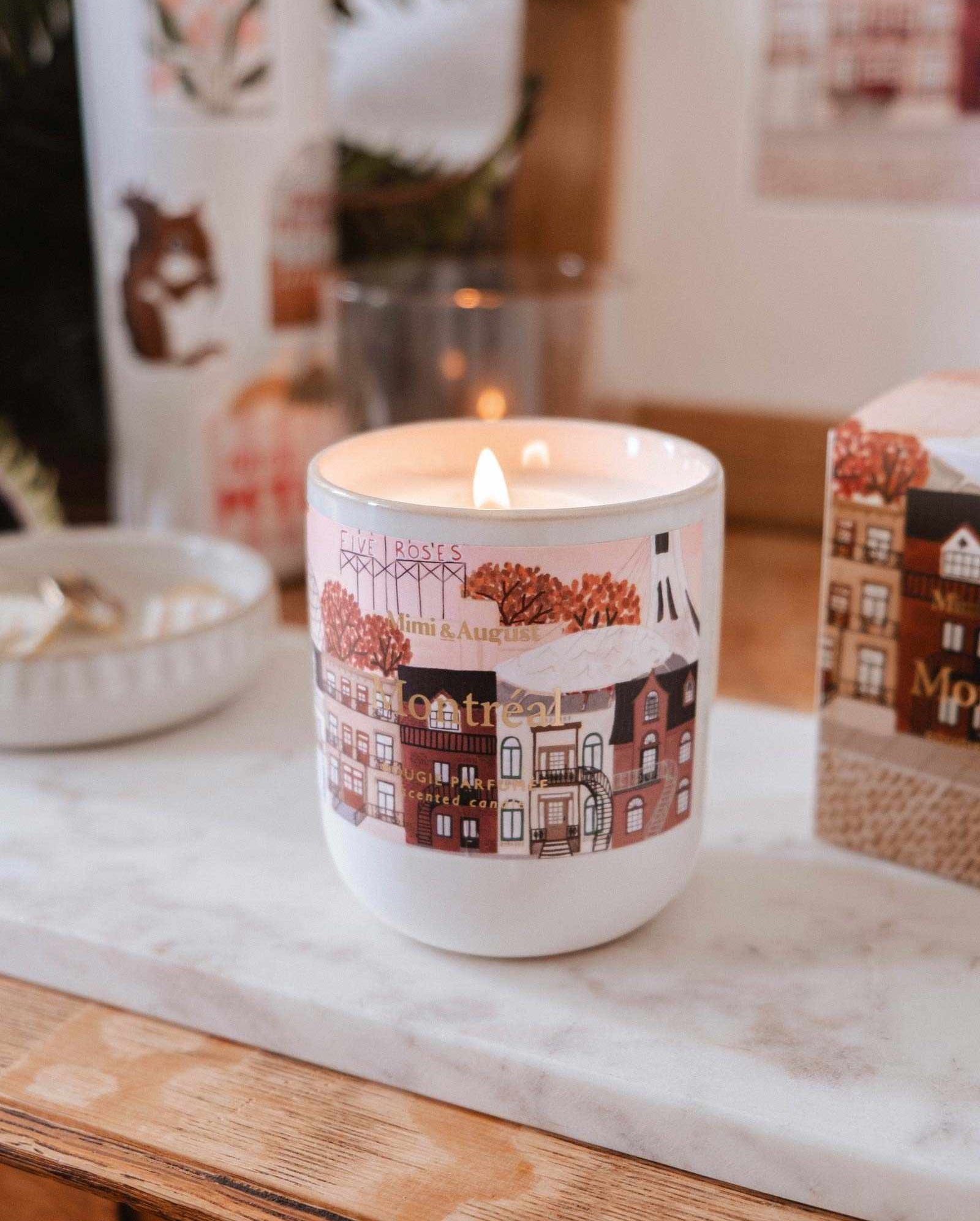 Reusable candle inspired by Montreal with dark rose, palo santo, and amber scents in a ceramic container