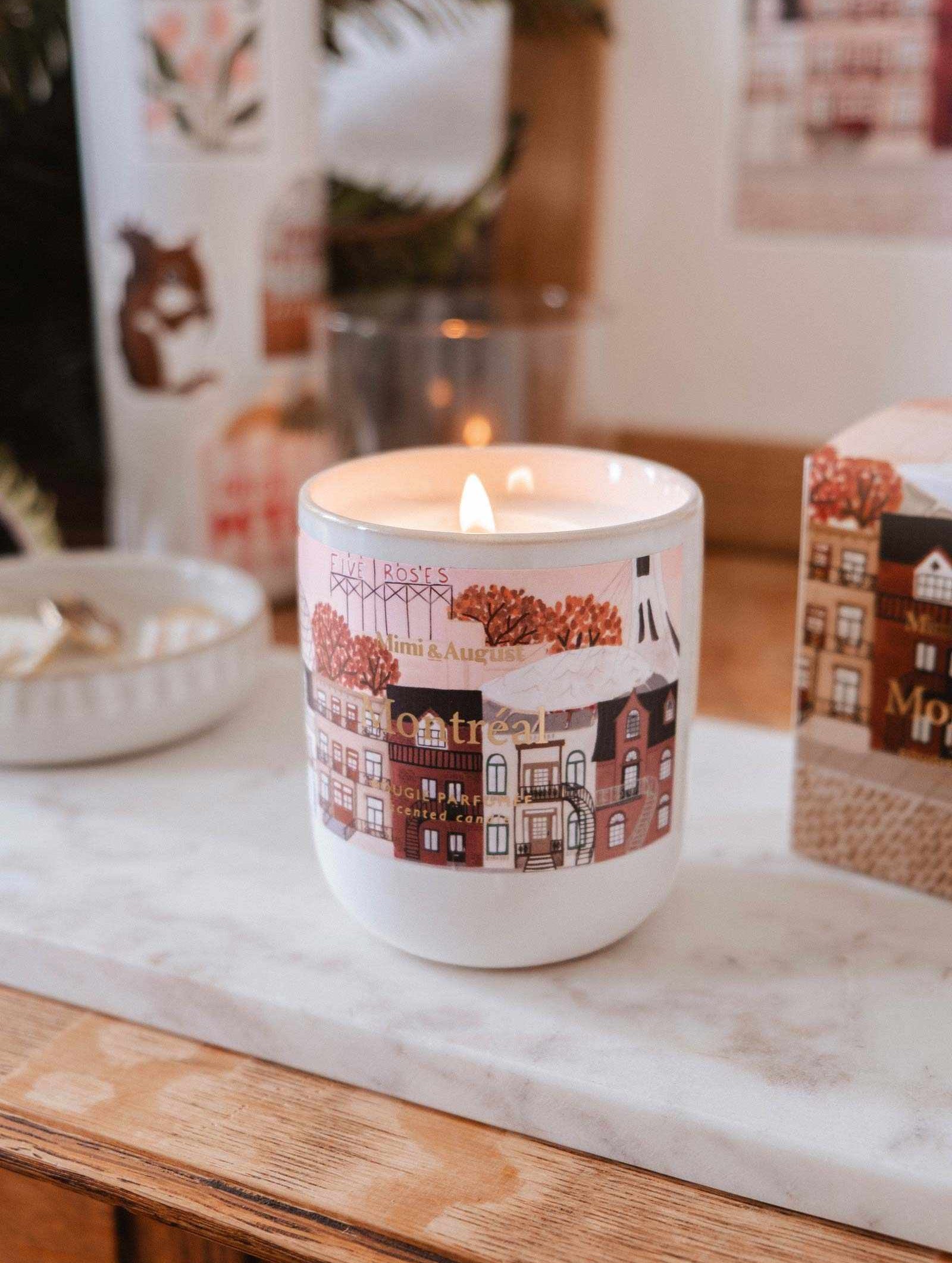 Reusable candle inspired by Montreal with dark rose, palo santo, and amber scents in a ceramic container