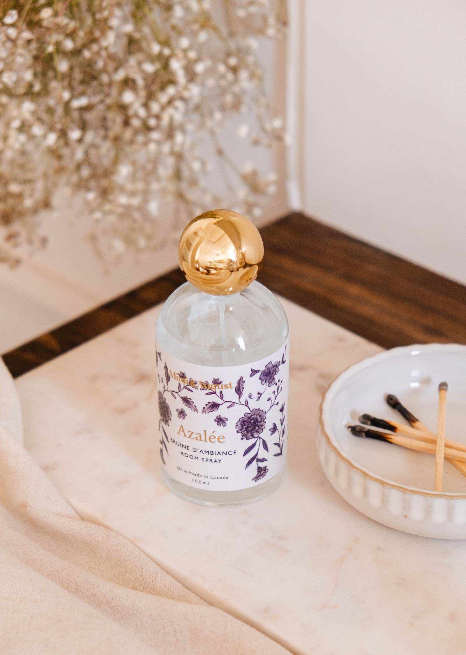 Azalée Room Spray bottle with floral and wood scent ingredients for home ambiance