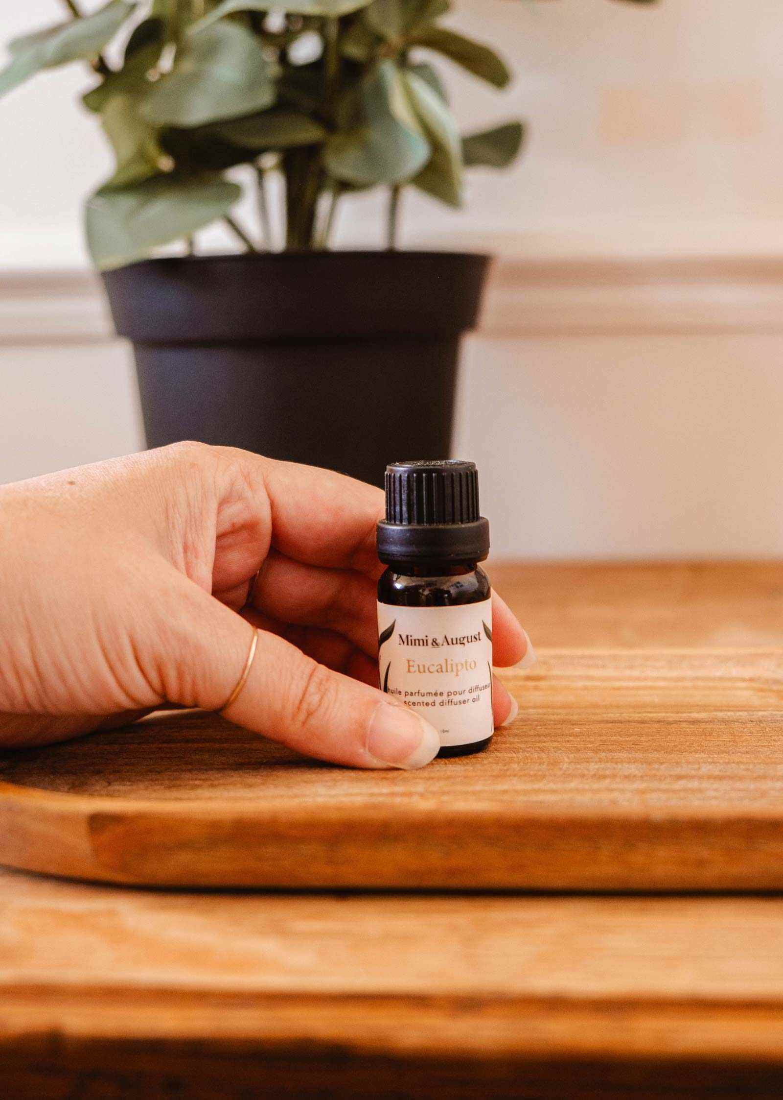 Eucalipto scented oil bottle with eucalyptus leaves for refreshing, relaxing aroma