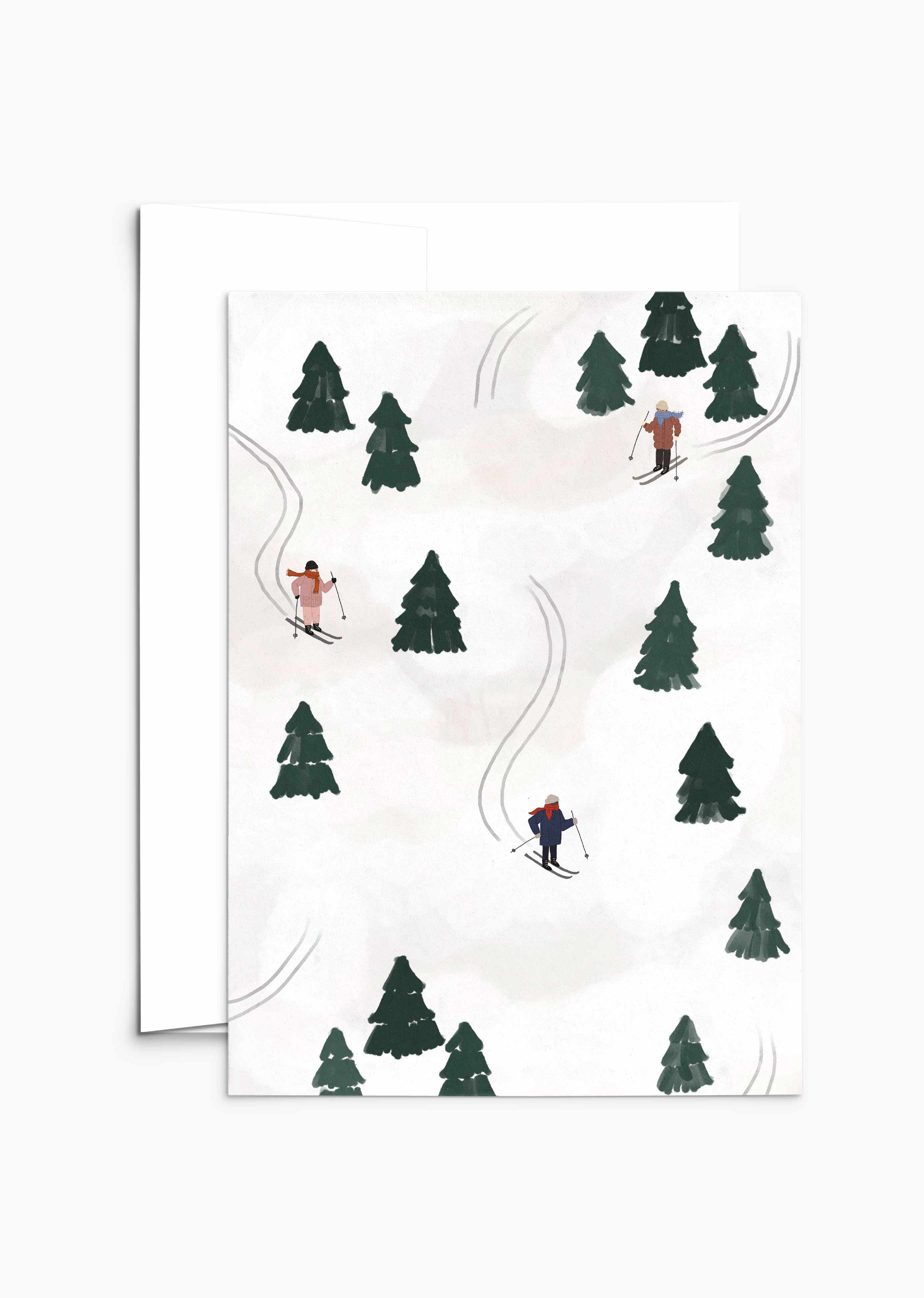 Christmas greeting card with hand-illustrated winter skiers on snowy slopes