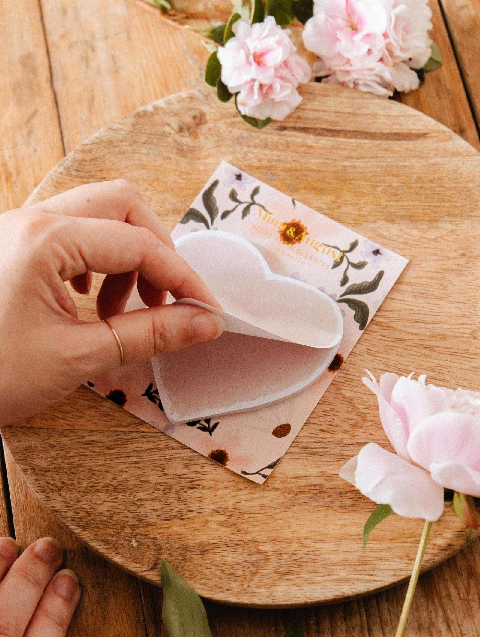 Soft pink heart-shaped Sweetheart Sticky Notes pad with 50 sheets and easy tearaway