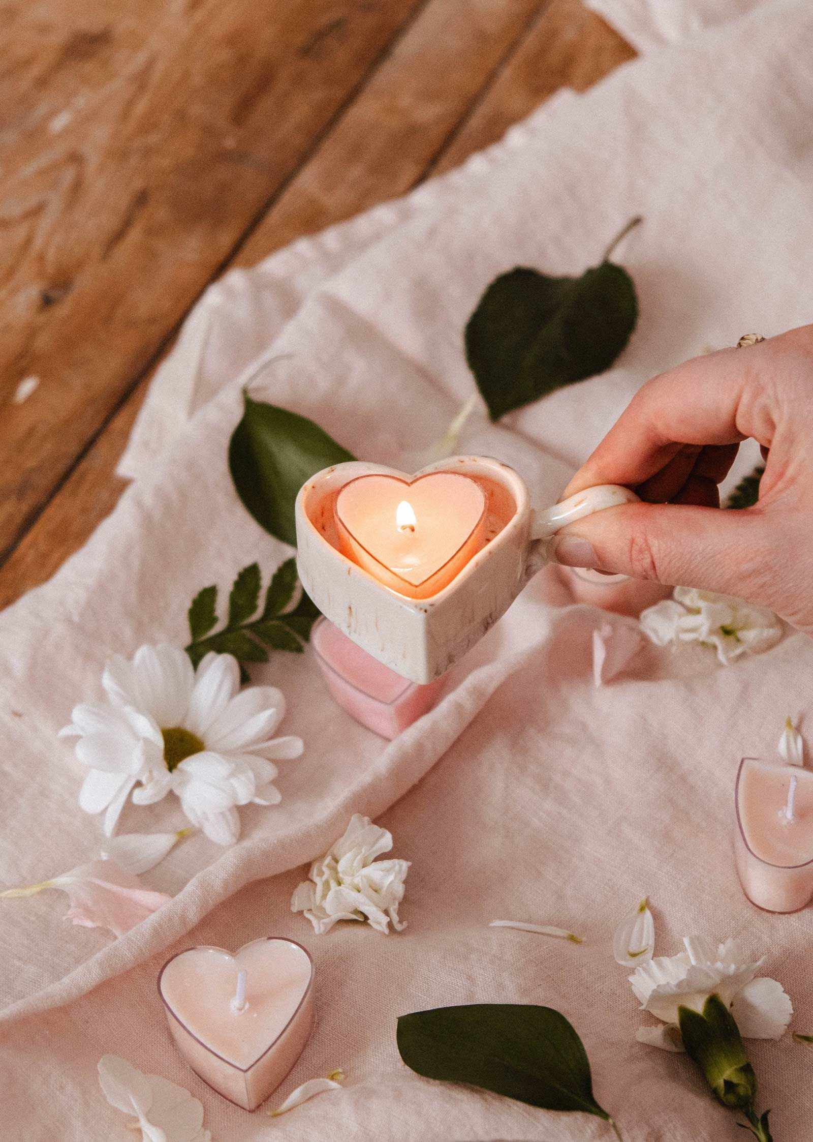 Speckled Heart Tealight Holder made of speckled ceramic with organic heart shape for heart-shaped tealights