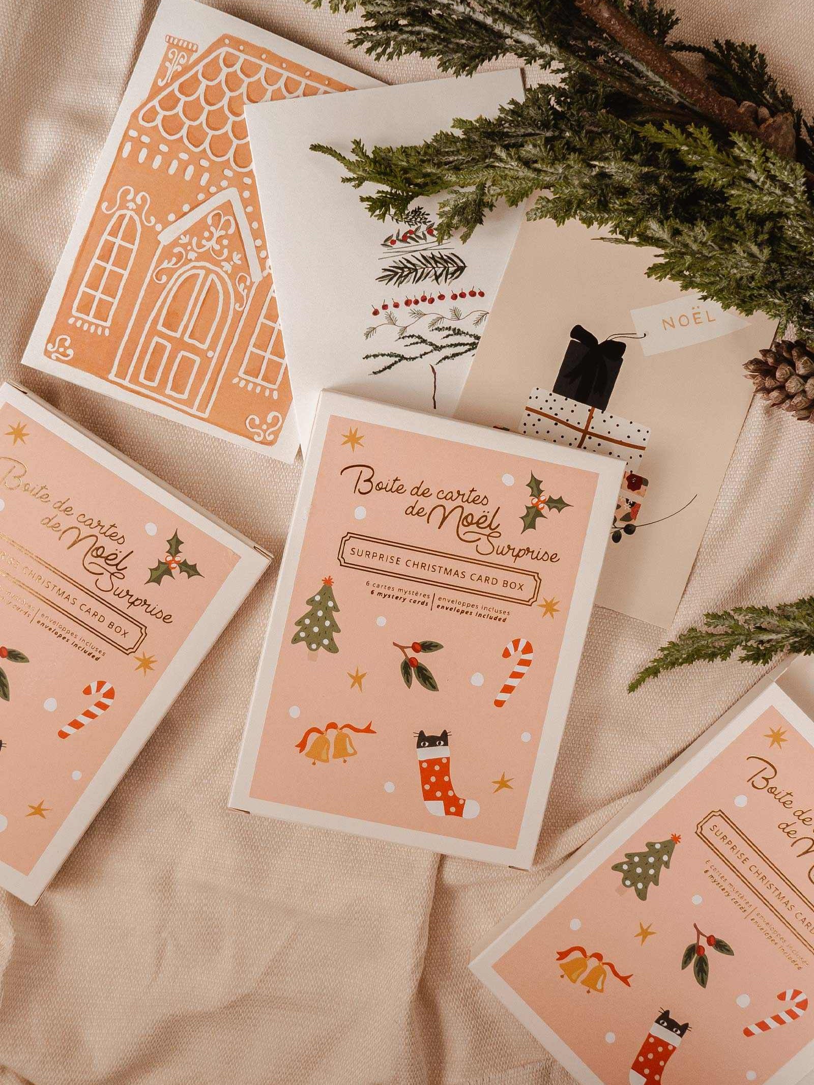 Christmas mystery card box, cute sticker with tree, mistletoe, bells and candy cane. There is 6 greeting card inside the box. By Mimi & August