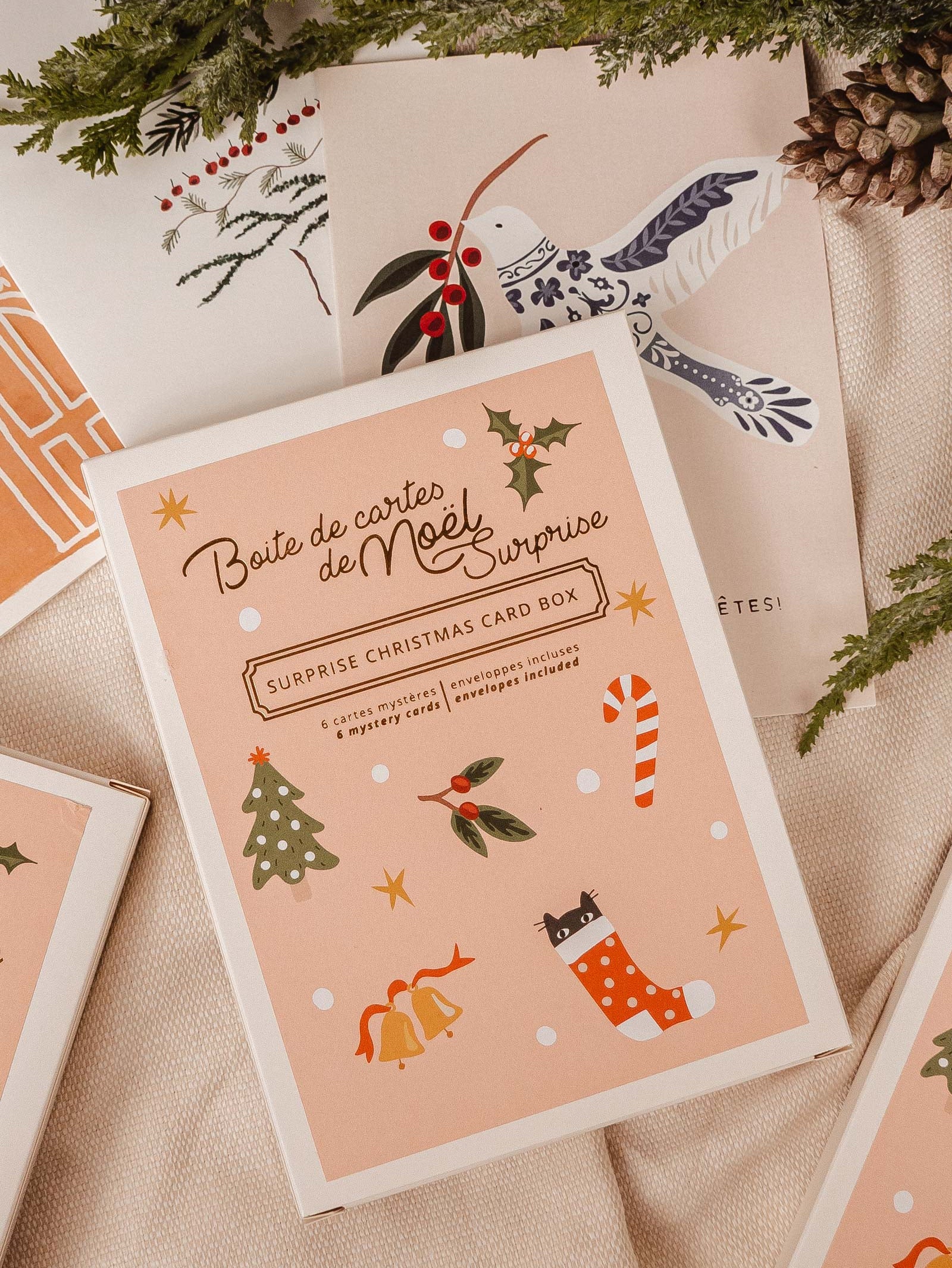 Beautiful Surprise Christmas card box with light pink joyful sticker. Including 6 greeting cards, all different inside. By Mimi & August