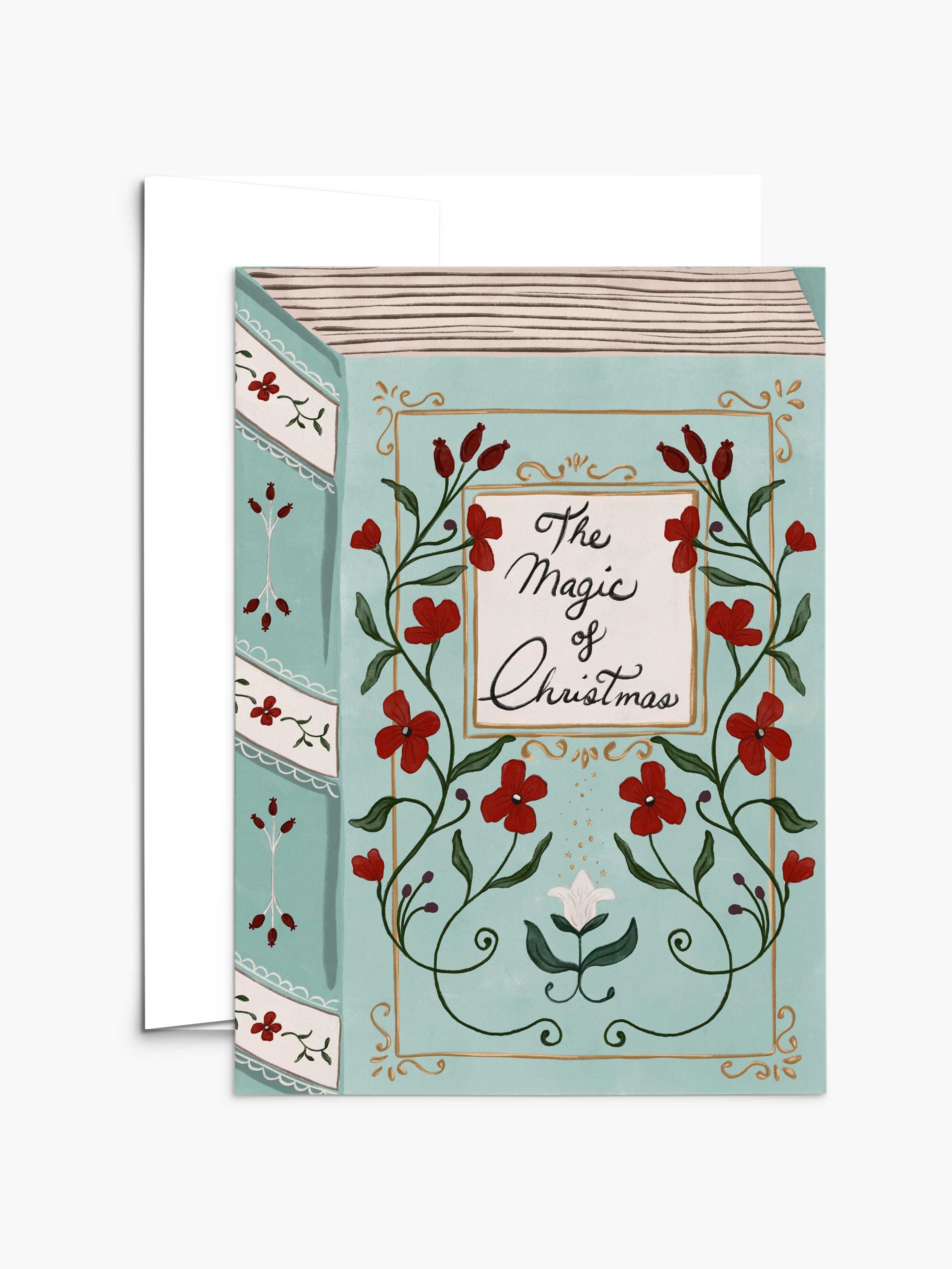 The Magic of Christmas Greeting Card by Mimi & August features floral designs and the text "The Magic of Christmas" on a light blue cover. Includes a matching envelope. The card is blank inside for your personal message.