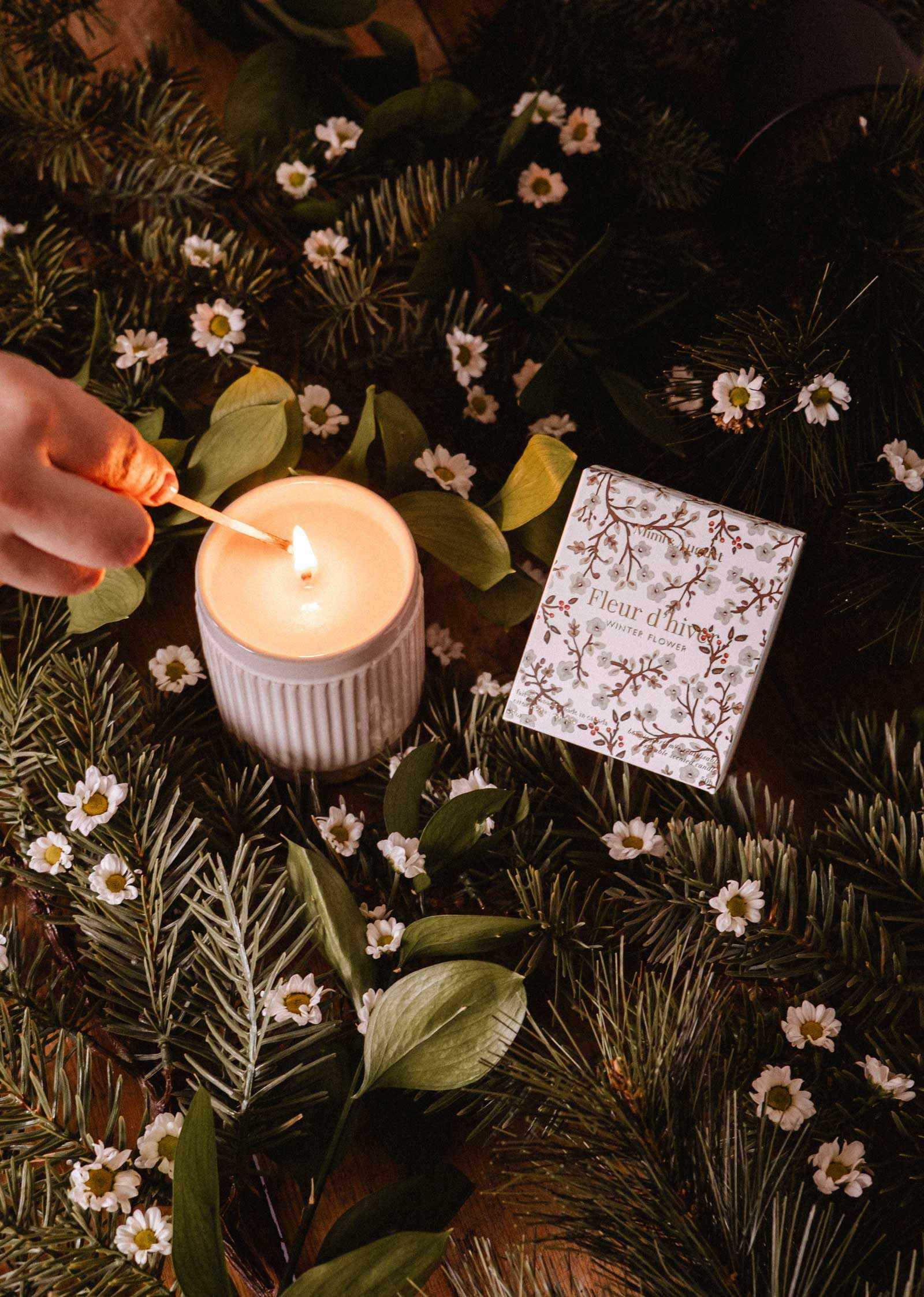 Winter Flower Christmas Candle in ceramic container with warm floral scent and cozy holiday glow