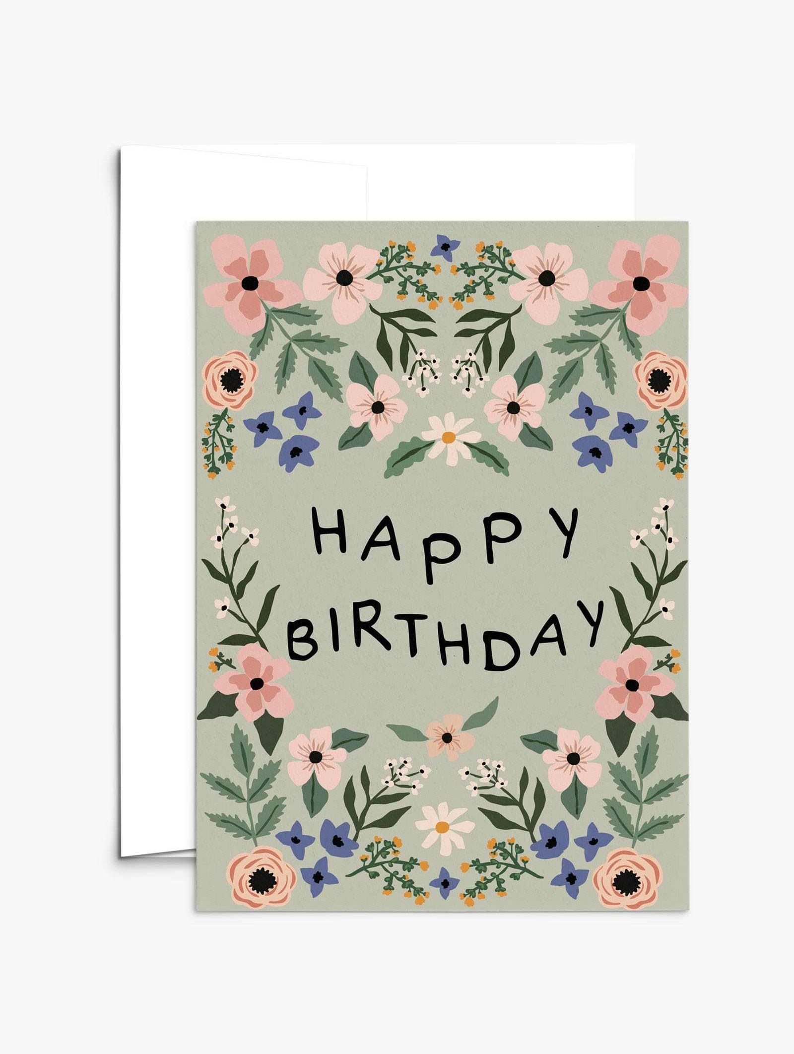 Garden birthday card with vibrant flowers on recycled paper and compostable packaging