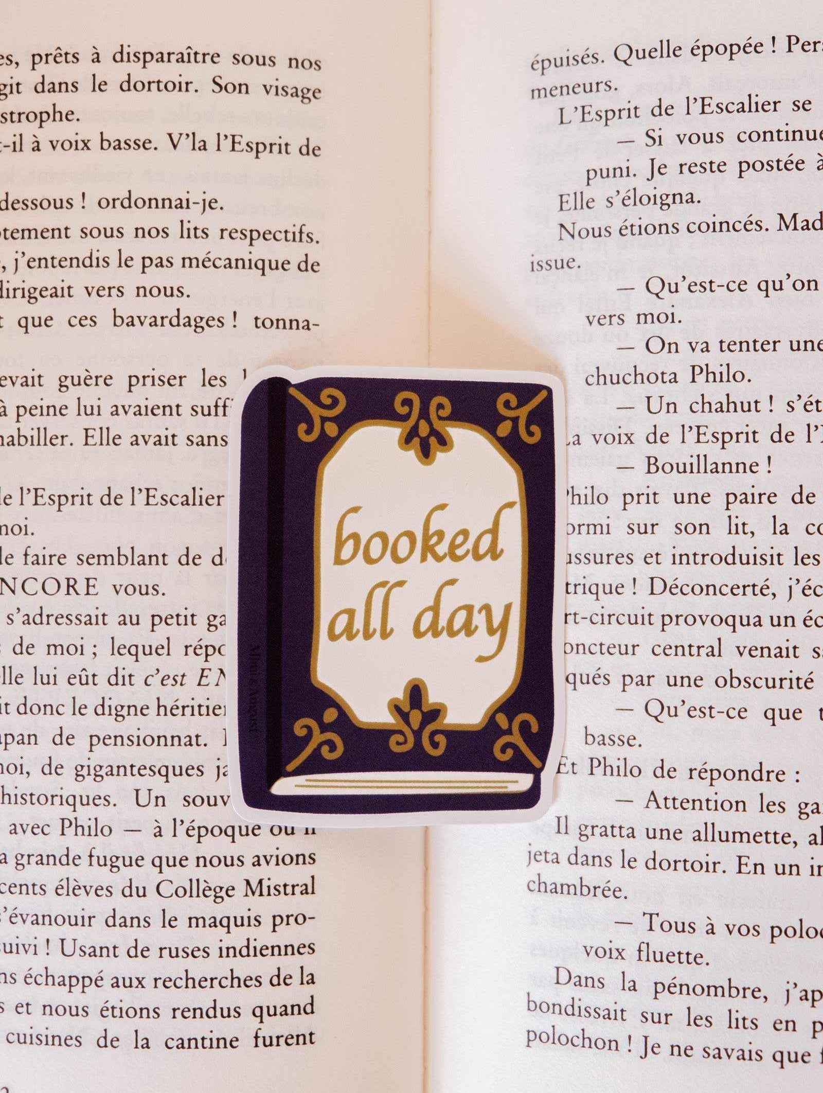 Booked All Day vinyl sticker with vintage design and gold lettering, waterproof and durable for book lovers