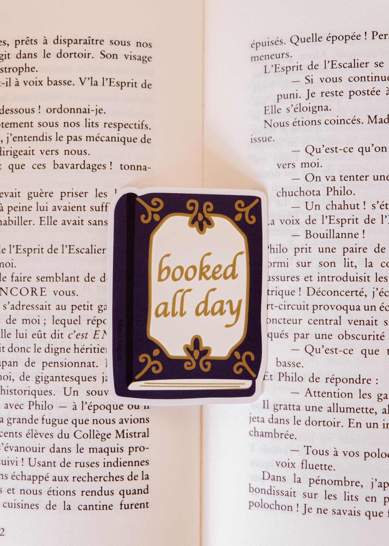 Booked All Day vinyl sticker with vintage design and gold lettering, waterproof and durable for book lovers