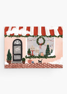 holidays greeting card featuring beautiful pink boutique with christmas decorations inside. By Mimi & August
