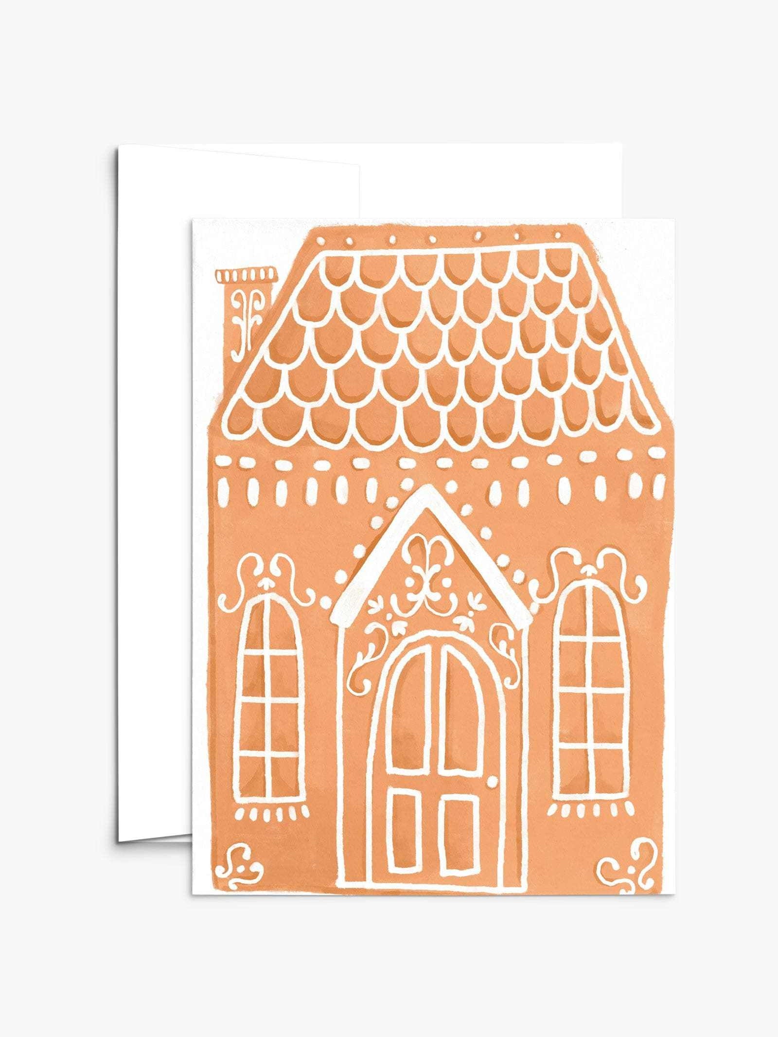 Magical enchanted gingerbread house Christmas greeting card on recycled matte cardstock with compostable packaging
