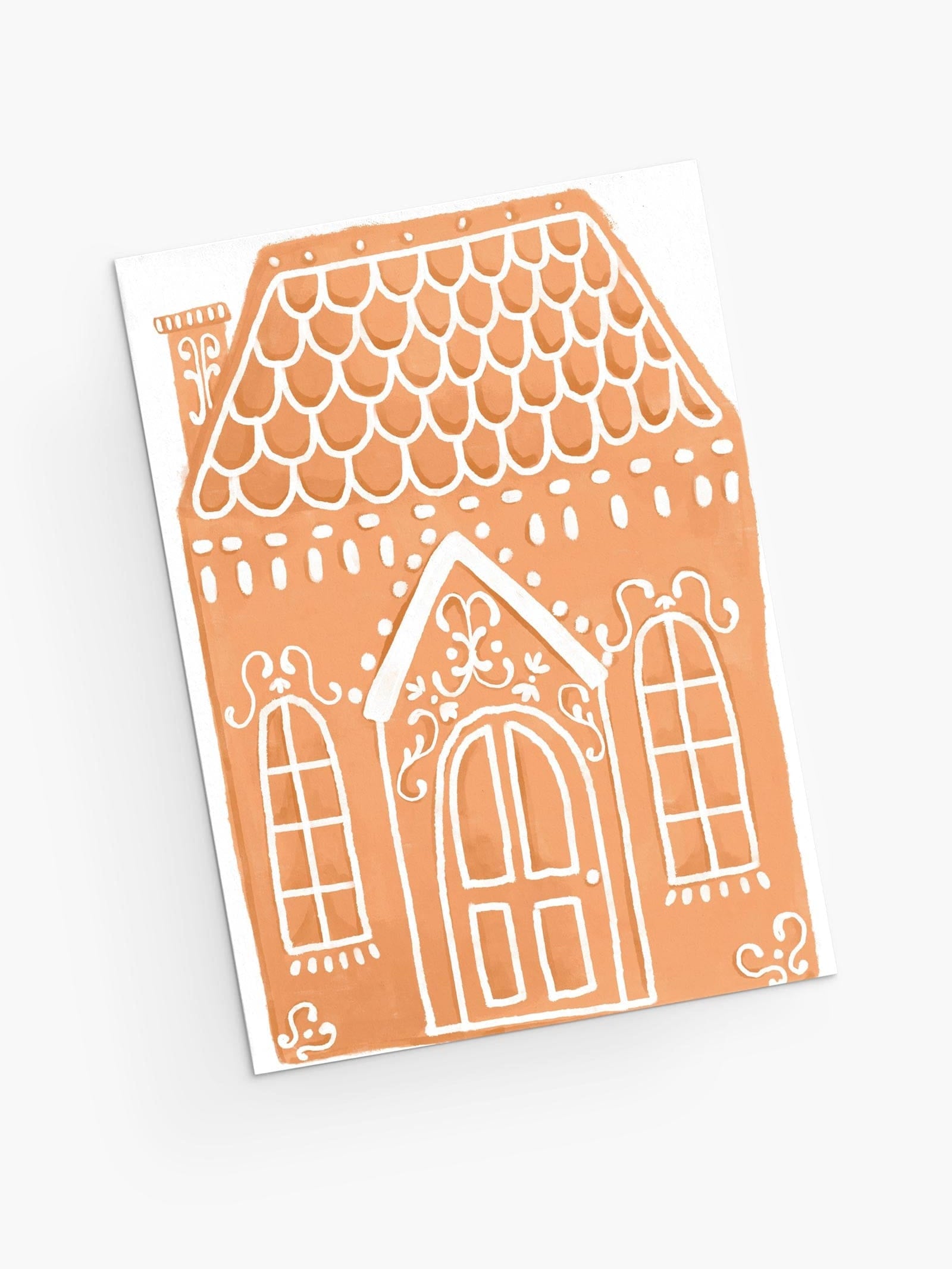 Magical Christmas greeting card featuring an enchanted pastry with frosting, a gingerbread house. Perfect for those with a sweet tooth! By Mimi & August