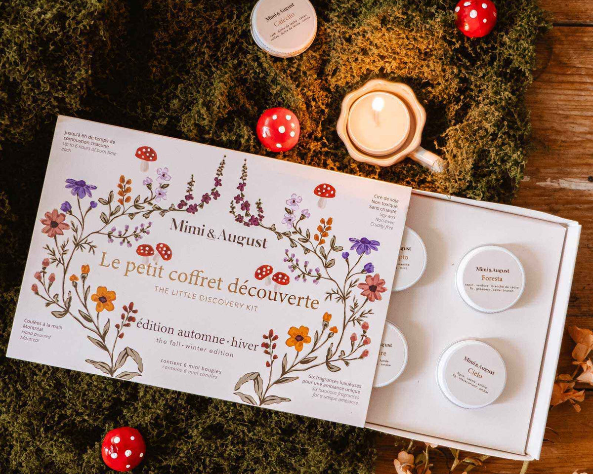 fall candle gift set with six soy tealights in a floral illustrated winter discovery box