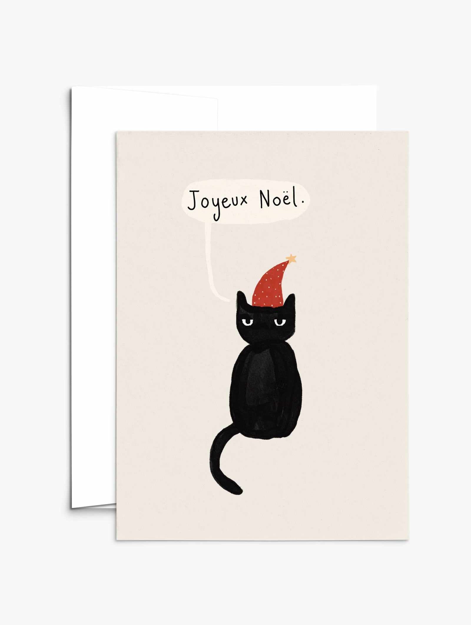 Grumpy Christmas Cat greeting card on recycled paper with white envelope and compostable packaging