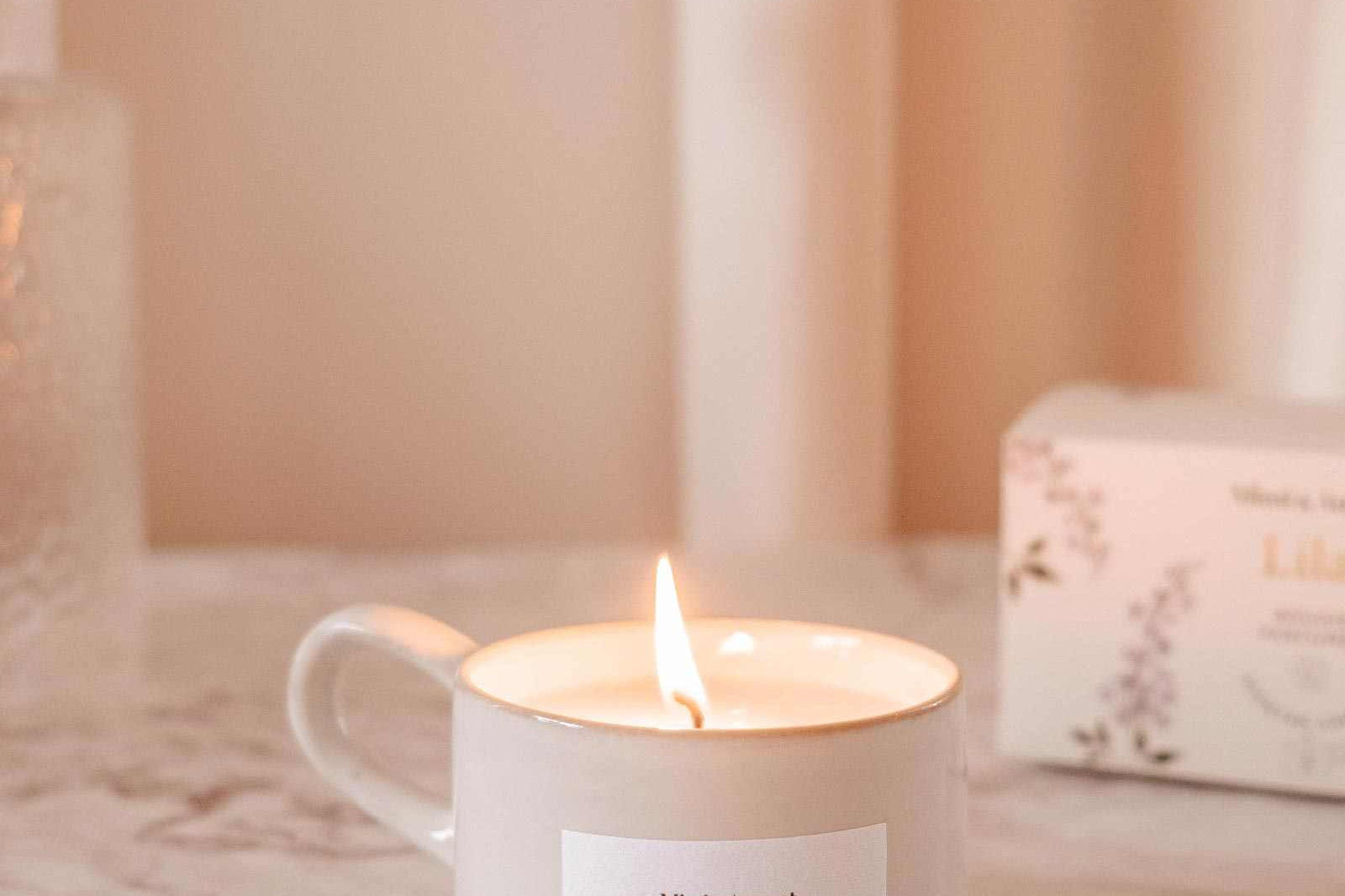 Lilac reusable candle in speckled gray cup with calming lilac scent for aromatherapy and home decor
