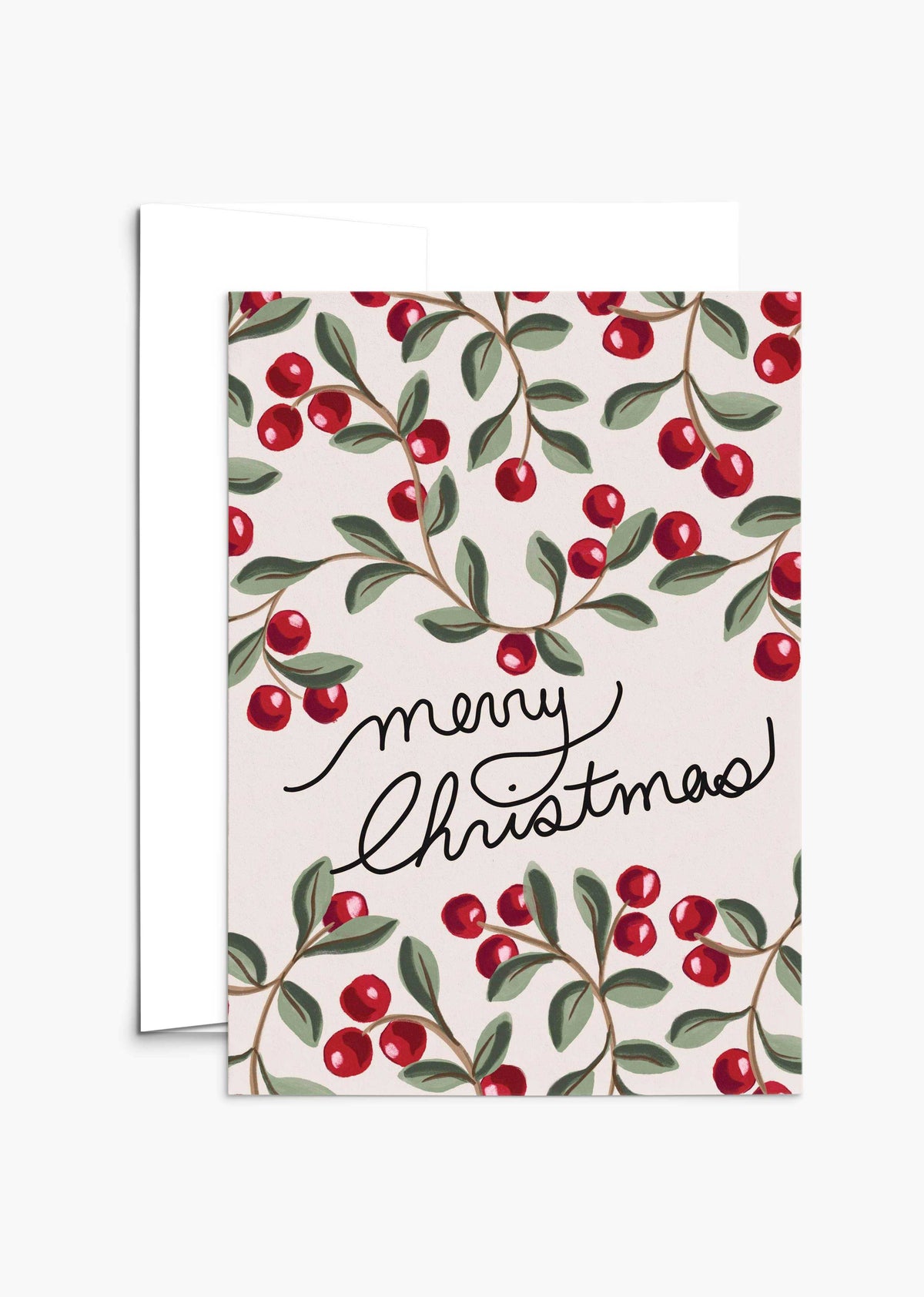 The Merry Christmas Greeting Card by Mimi & August features "Merry Christmas" in cursive with red berries and green leaves on a light background. Printed on recycled paper, it's blank inside for your message.