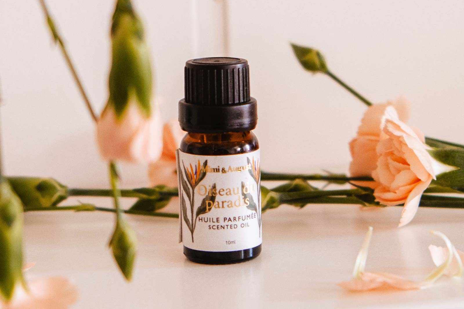 Bottle of Oiseau du paradis scented oil with tropical fruit-inspired citrus scent