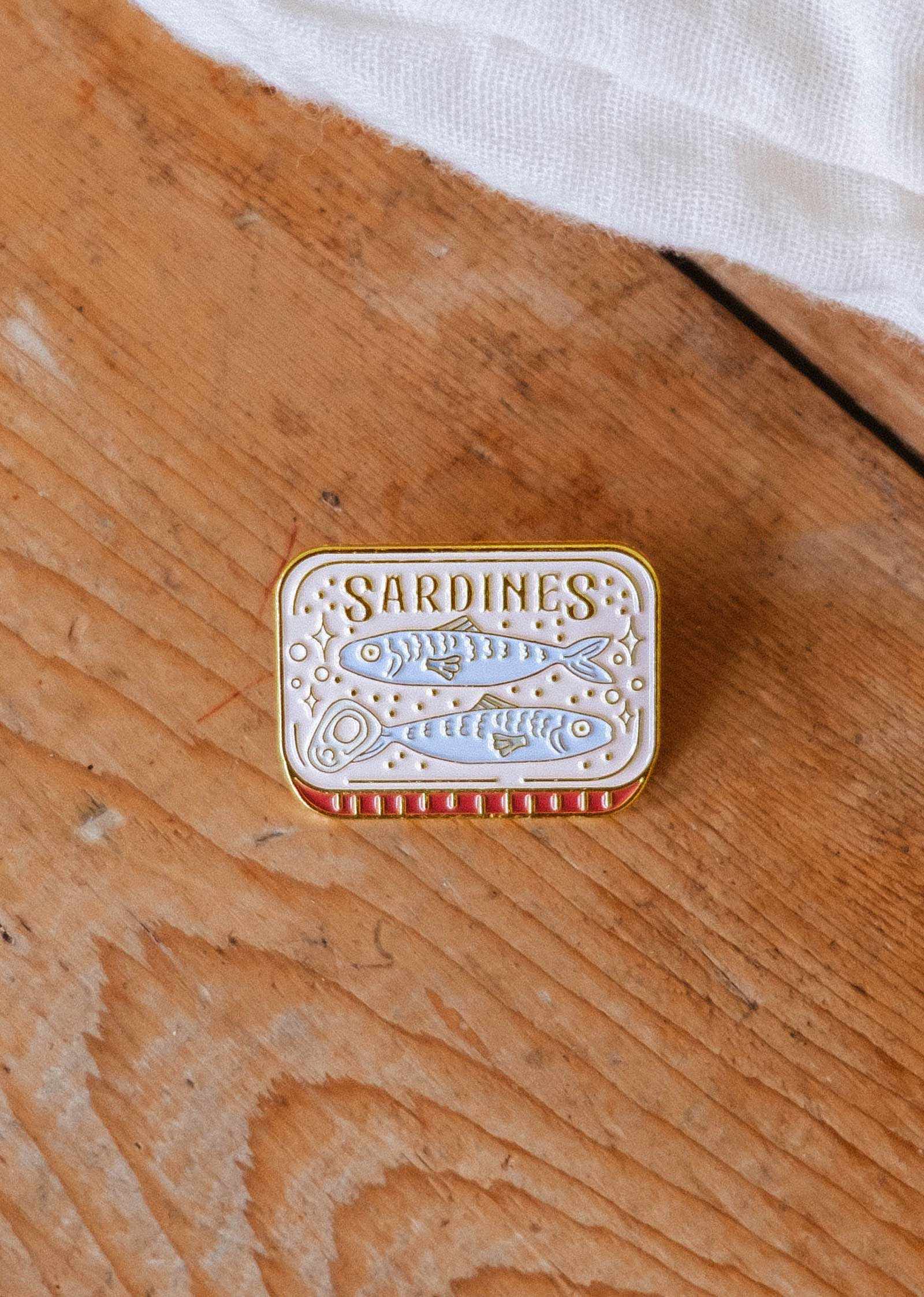 Cozy Sardines Enamel Pin gold tone brass with quirky tin design celebrating togetherness
