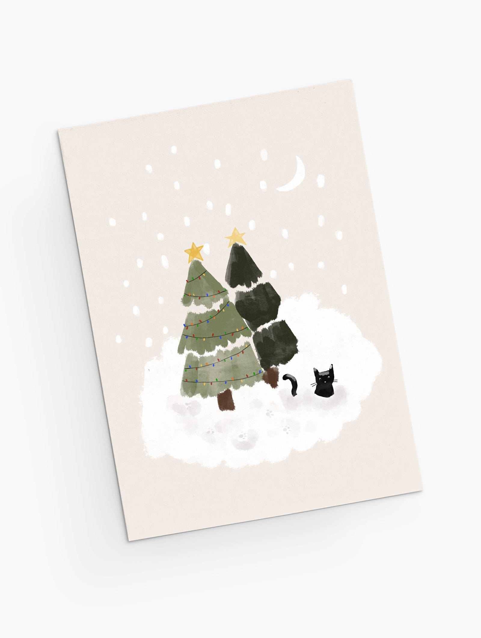 Holiday greeting card with christmas trees featuring a snowy cat under the trees. By Mimi & August
