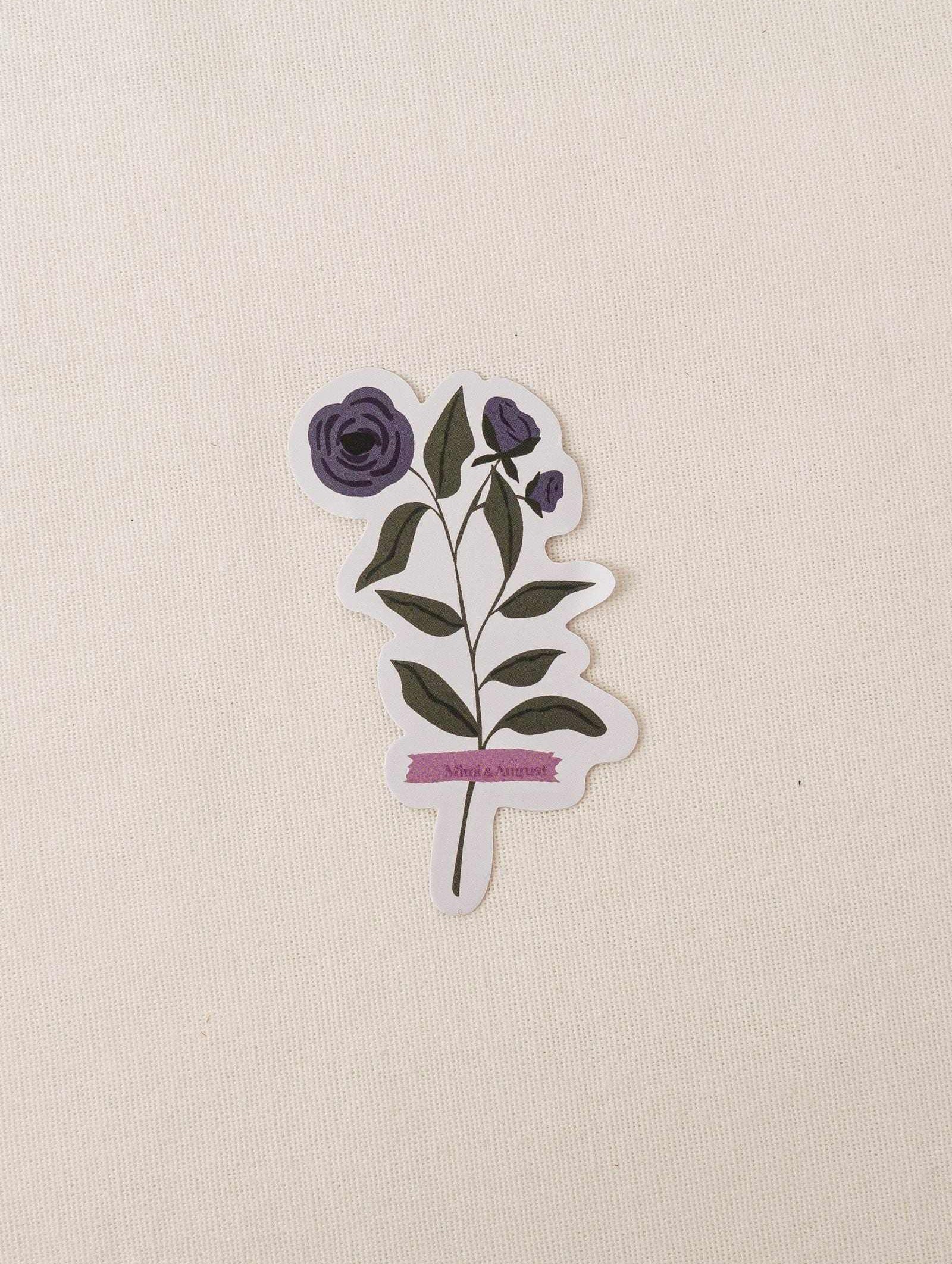 Blue Daisy vinyl sticker with blue flower illustration and green leaves on white background