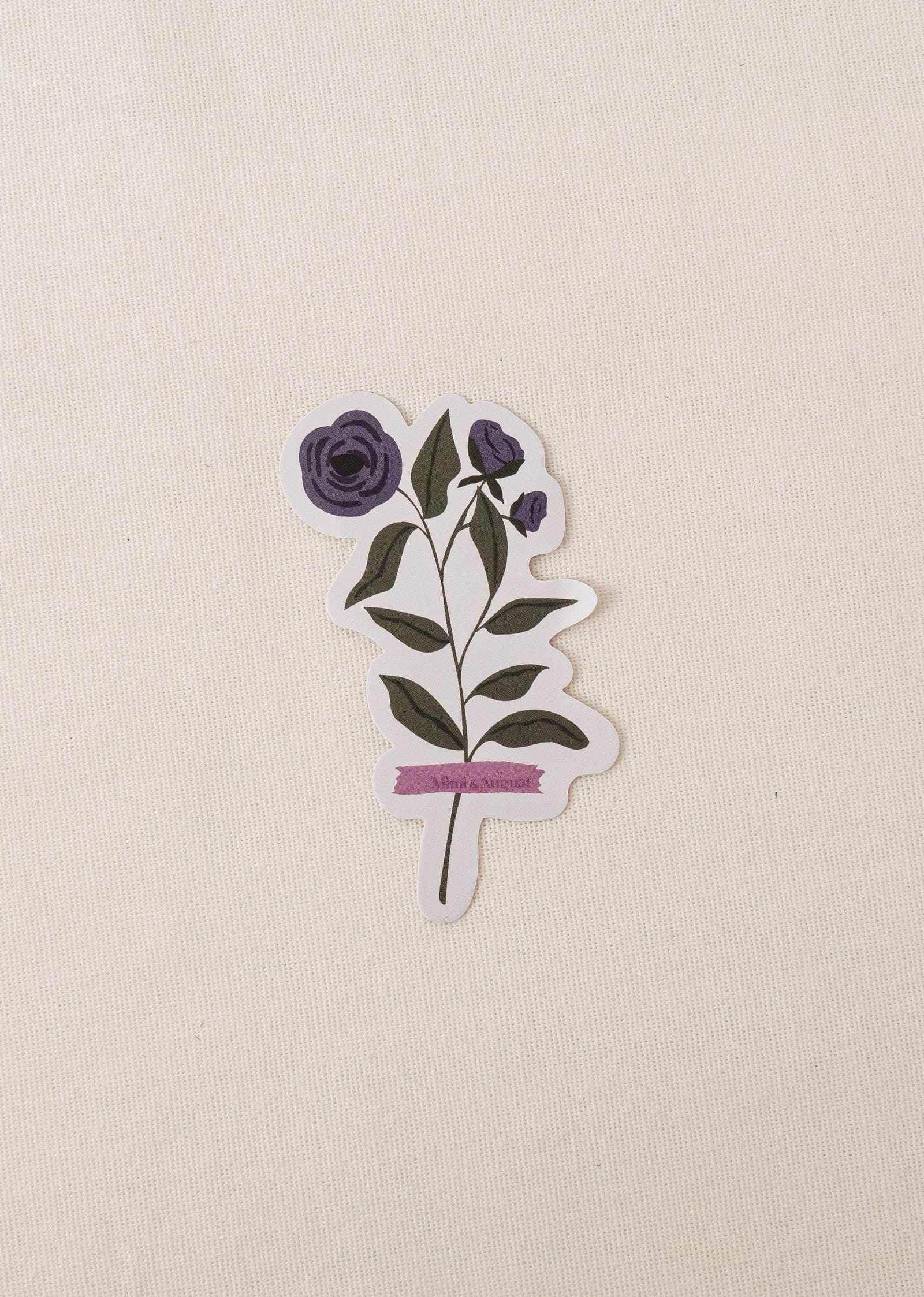 Blue Daisy vinyl sticker with blue flower illustration and green leaves on white background