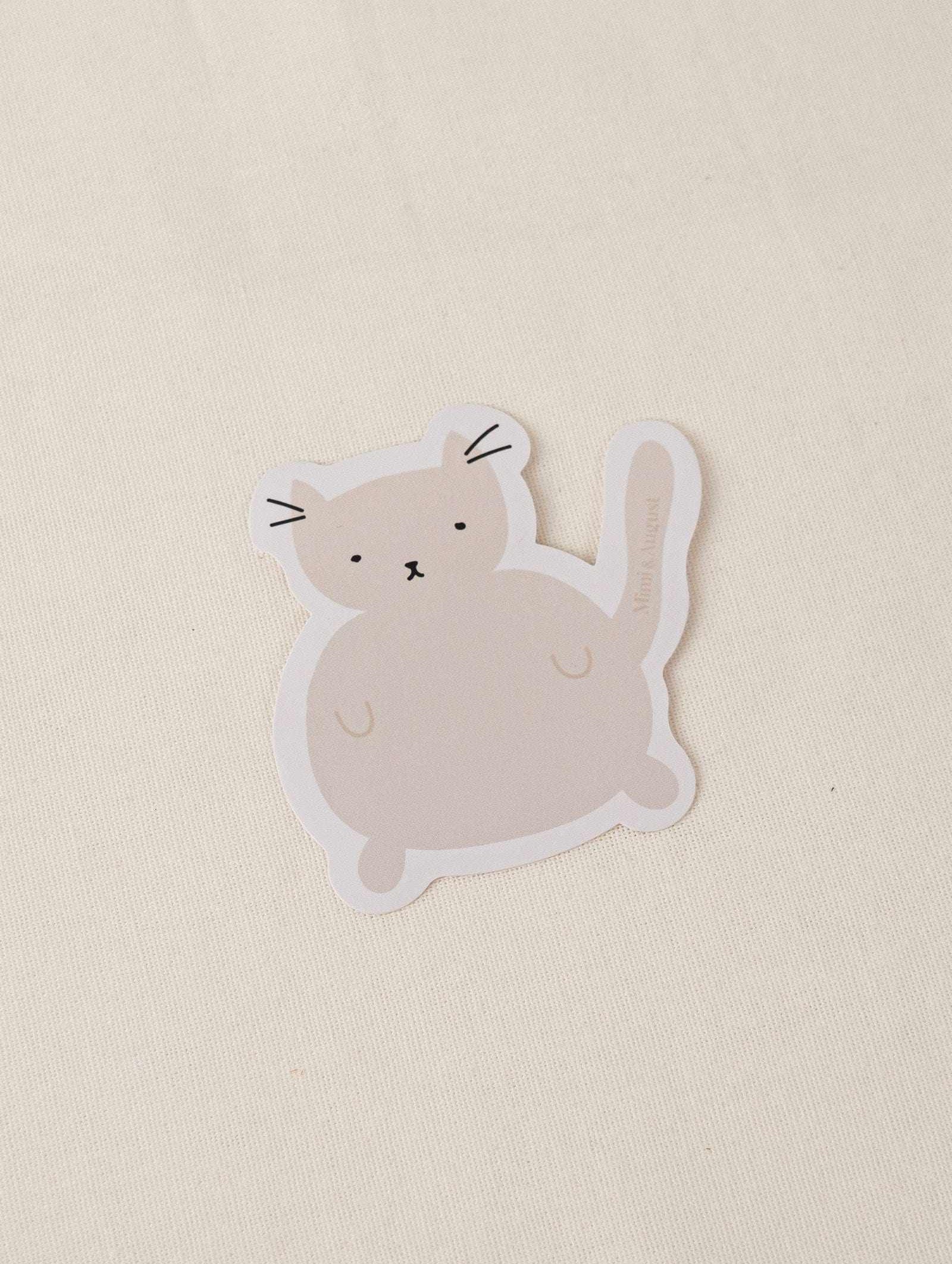 Charlotte vinyl sticker featuring a cute cat illustration with a white border on a beige background