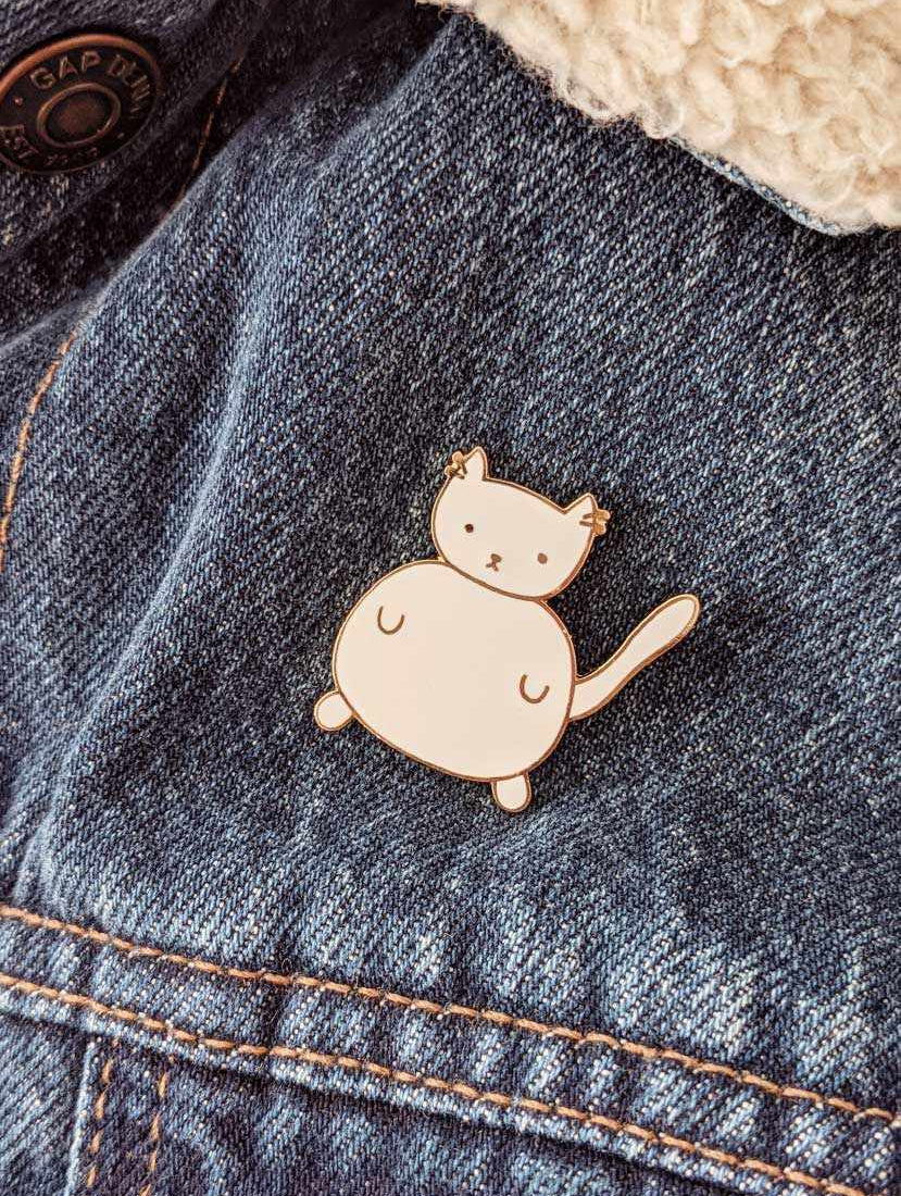 The smallest and cutest cat you can bring anywhere enamel pin by mimi & august