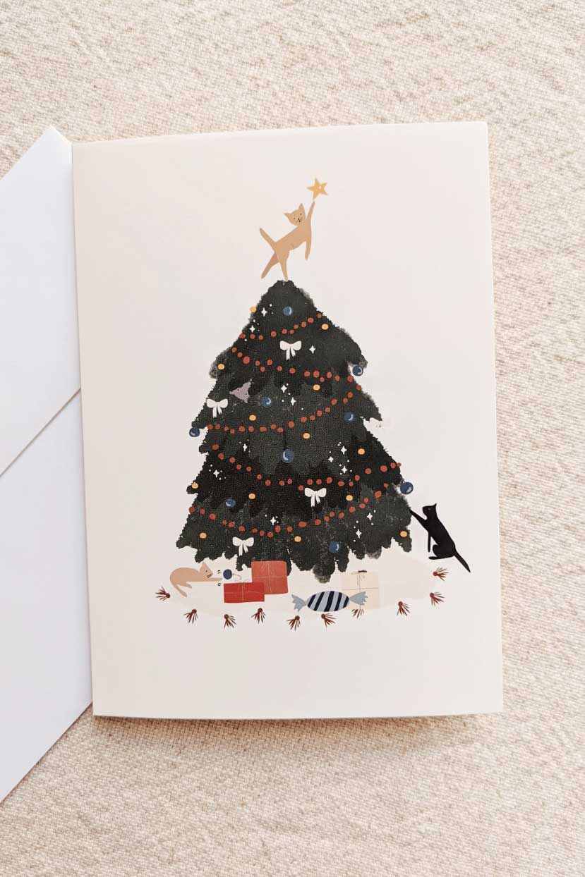 Christmas Tree Greeting Card with cat-themed design on recycled paper and white envelope