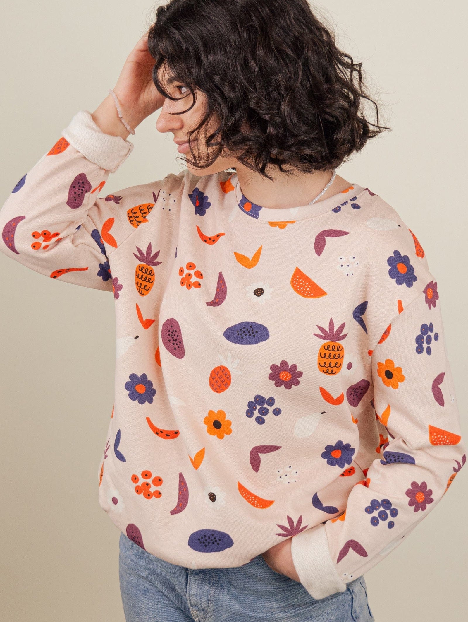 Rosalie wearing the happy fruits sweater - mimi and august