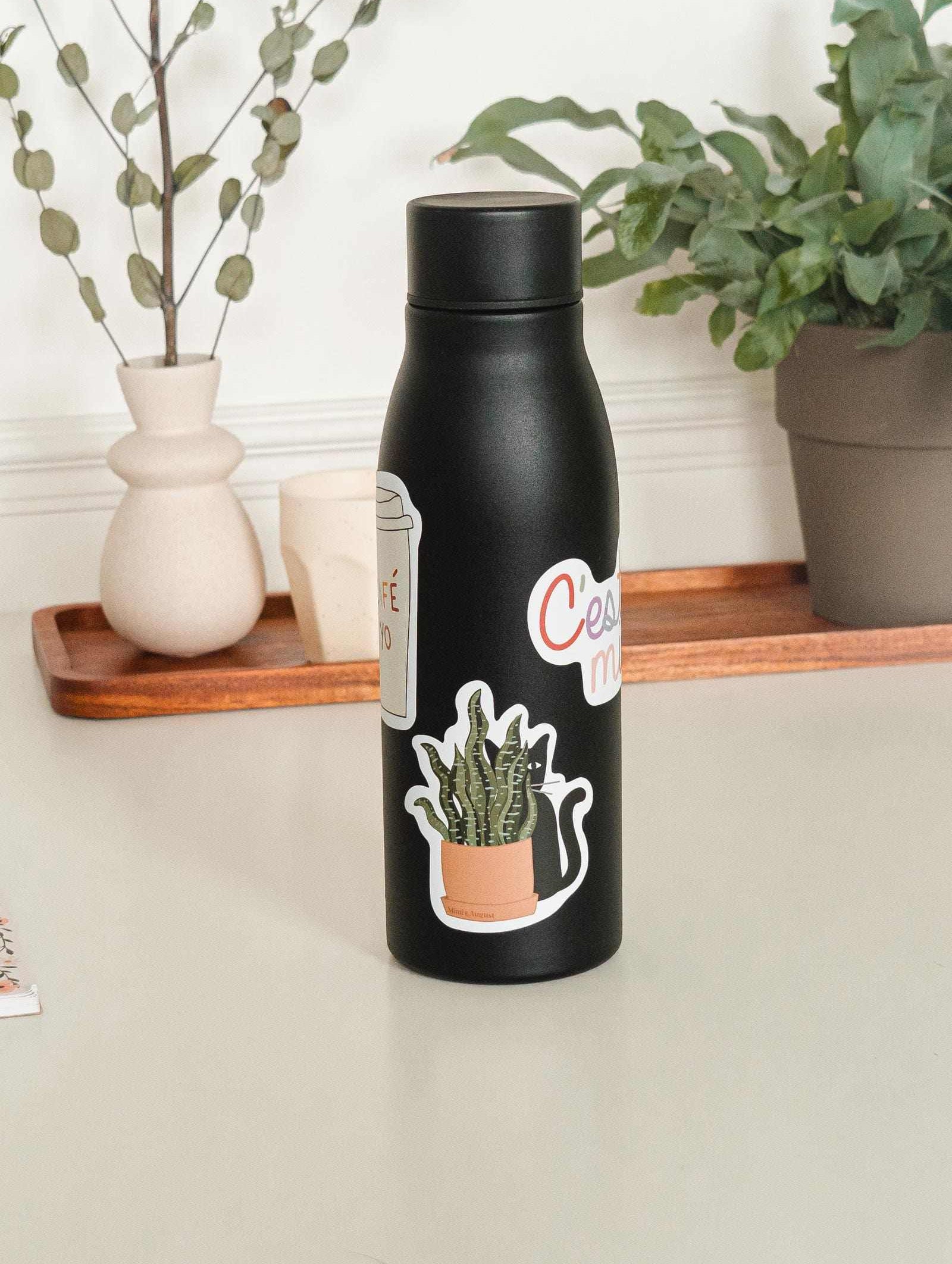 mimi and august sticker in water bottle