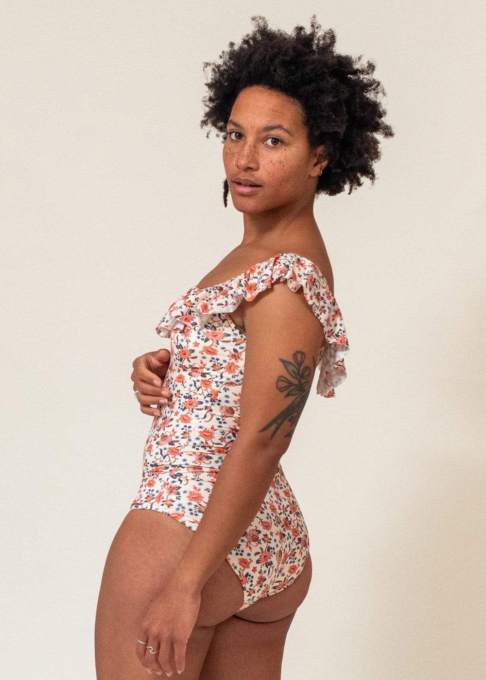 Aline wearing the Milano Amour Floral One Piece size S