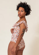 Aline wearing the Milano Amour Floral One Piece size S